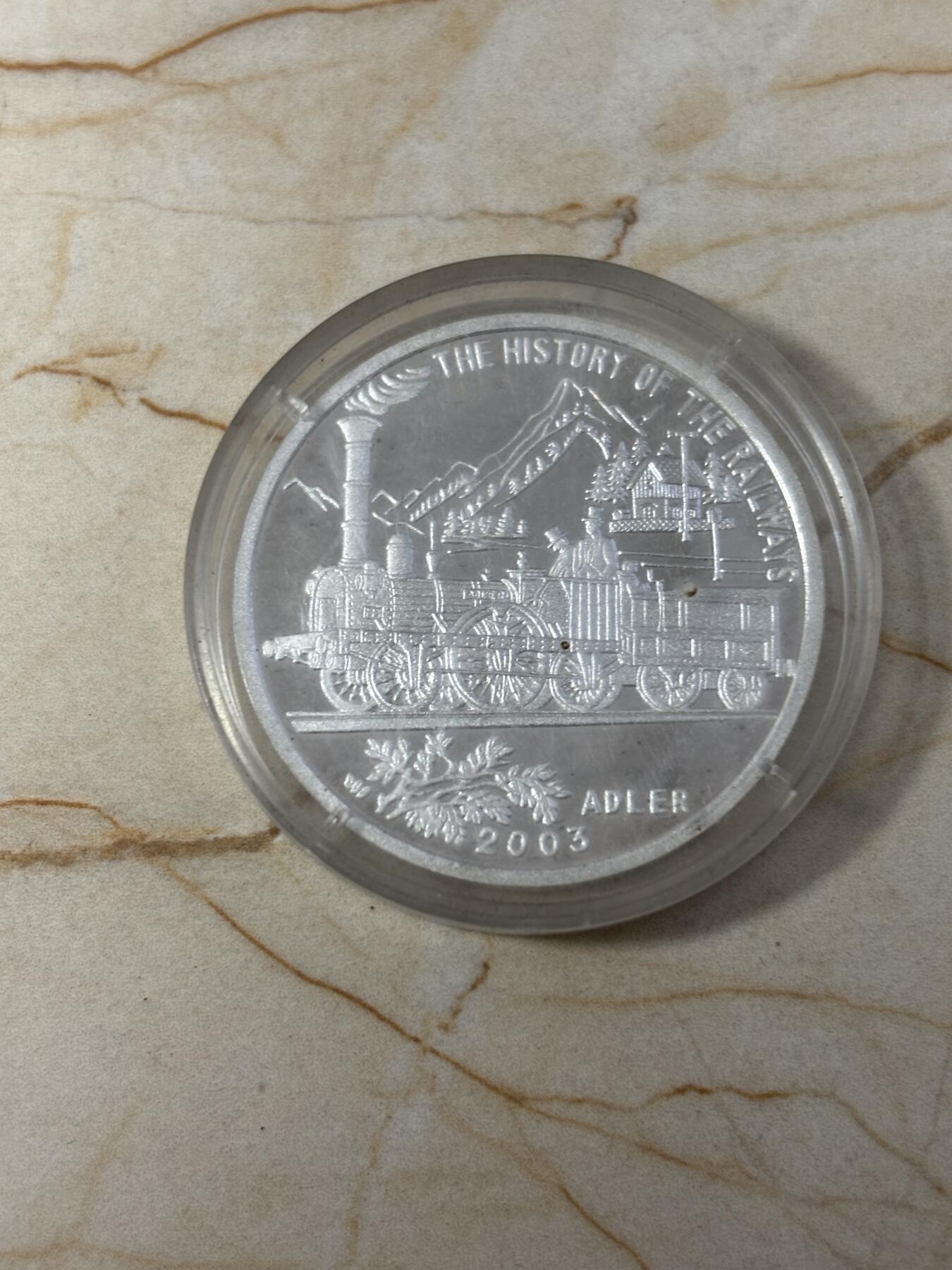 第190期拍卖 朝鲜2003年火车20克纪念银币3，999银