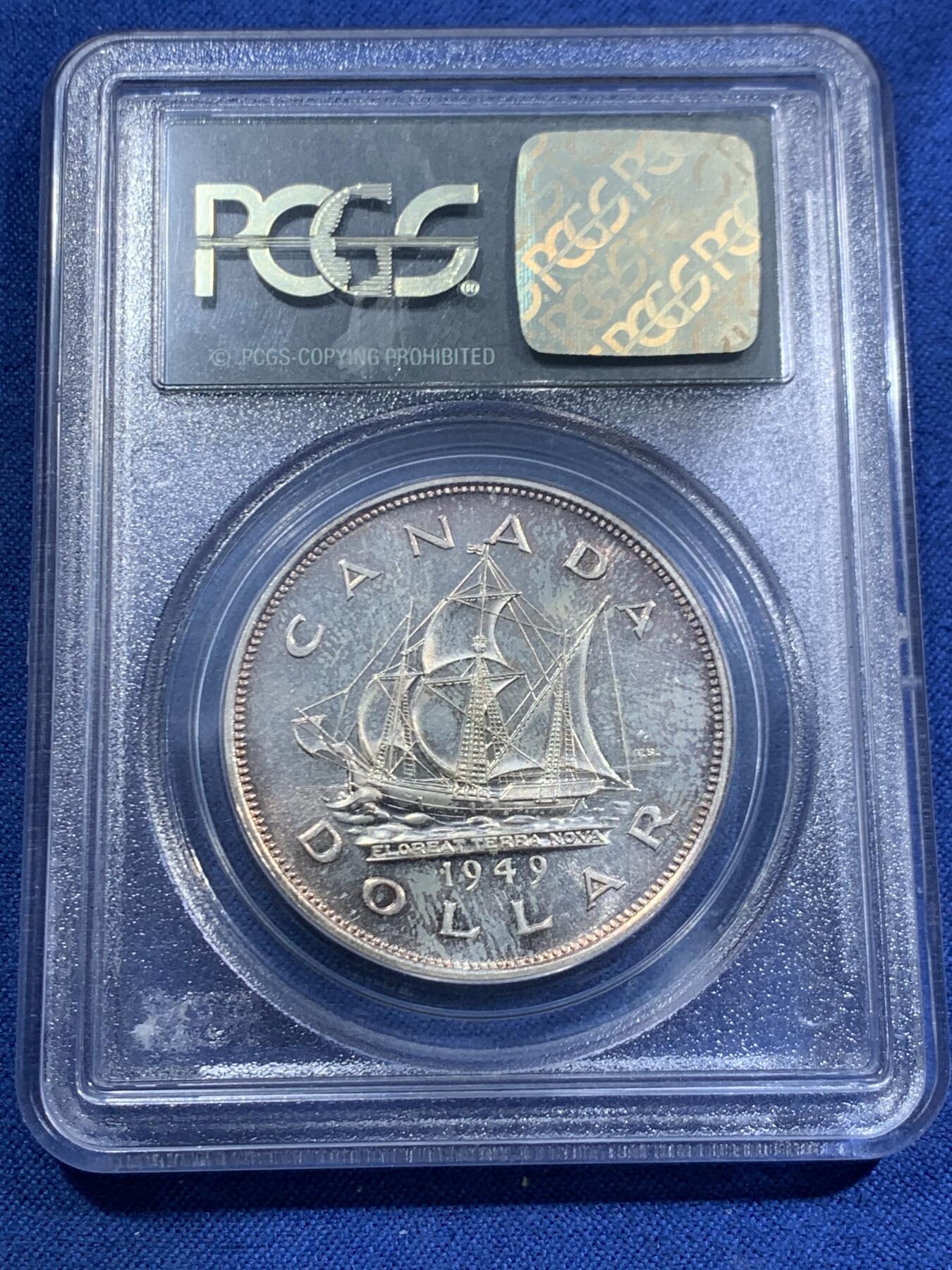 《竞宝斋》第463-465场 周日，周一，周二，3场连拍 （全场包邮）欢迎送拍 PCGS MS64 加拿大 1949年1DOLLAR帆船银币 原生状态，金橙色调主导的自然包浆使得局部泛现柔和虹彩，正背面细节锋利，轮廓清晰，非白币可比