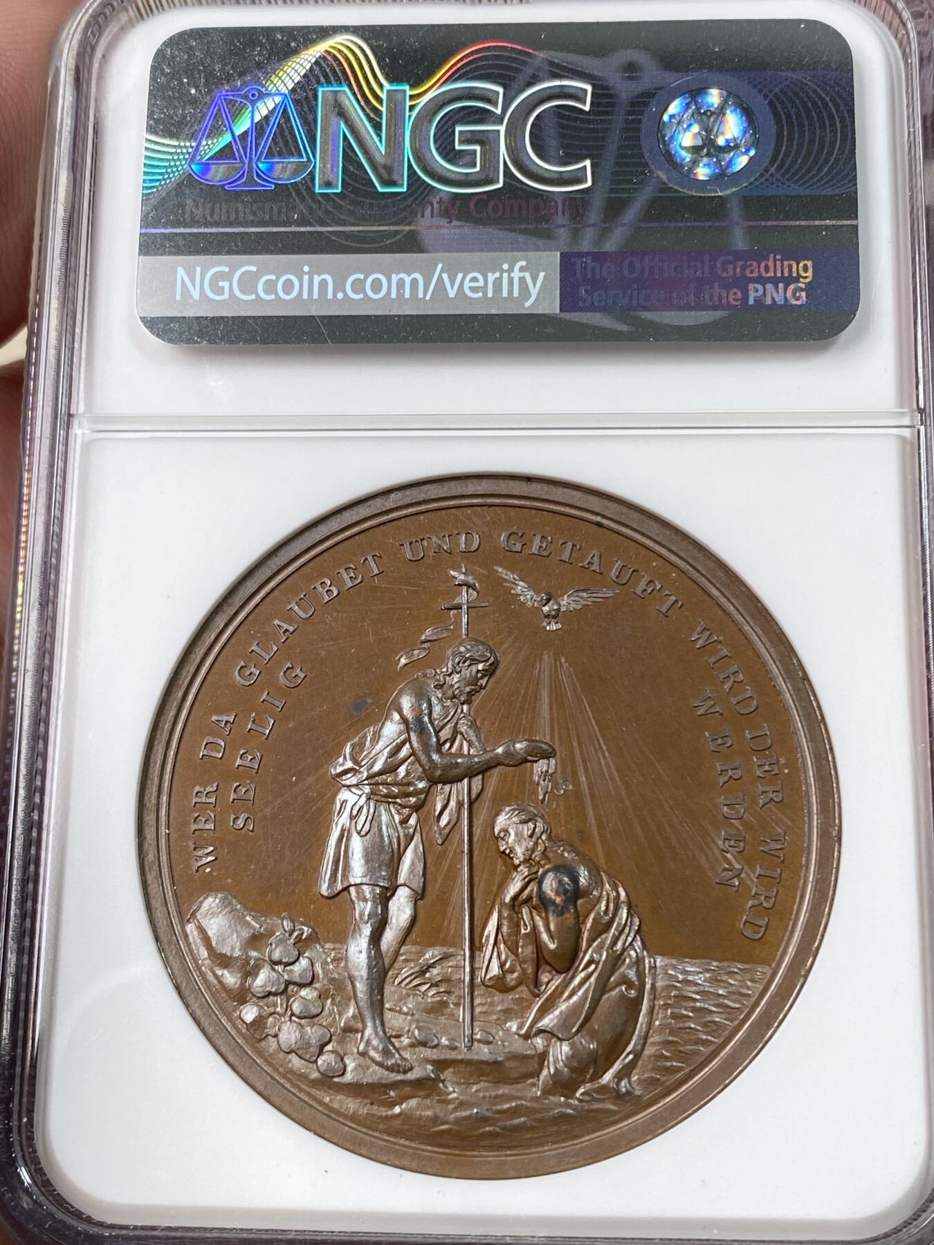 万国钱币拍卖第060期（万国六十期纪念大拍） NGC MS64 19世纪德国宗教洗礼铜章 背面是耶稣在约旦河中为约翰施洗的经典场景 转动时币面有圣光闪烁 原味高浮雕大规格收藏级品质
