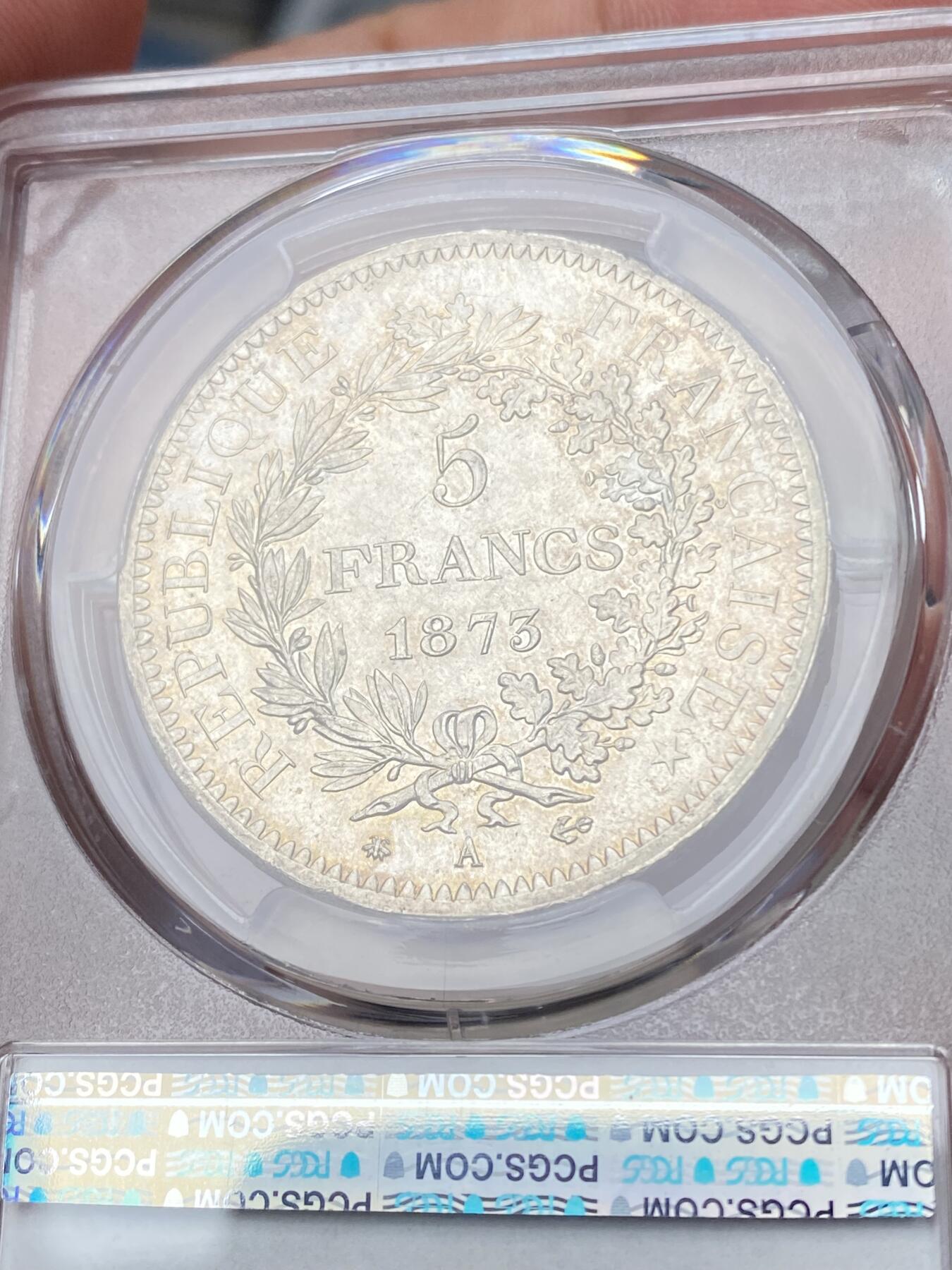 万国钱币拍卖第060期（万国六十期纪念大拍） PCGS MS65 1873法国大力神5法郎银币 经典品种 转光底板香槟金彩环绕 难得BU品质