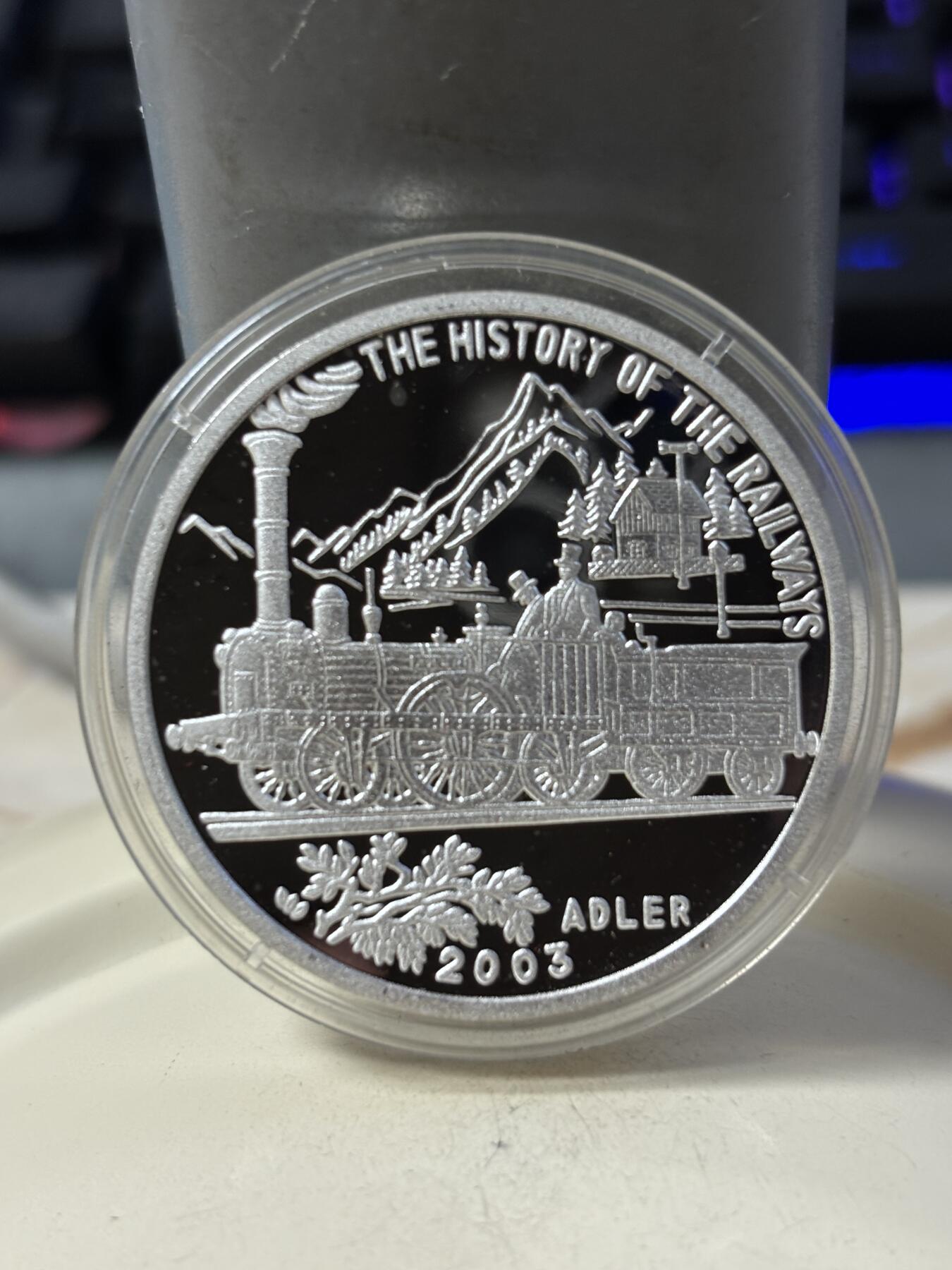 第190期拍卖 朝鲜2003年火车20克纪念银币3，999银