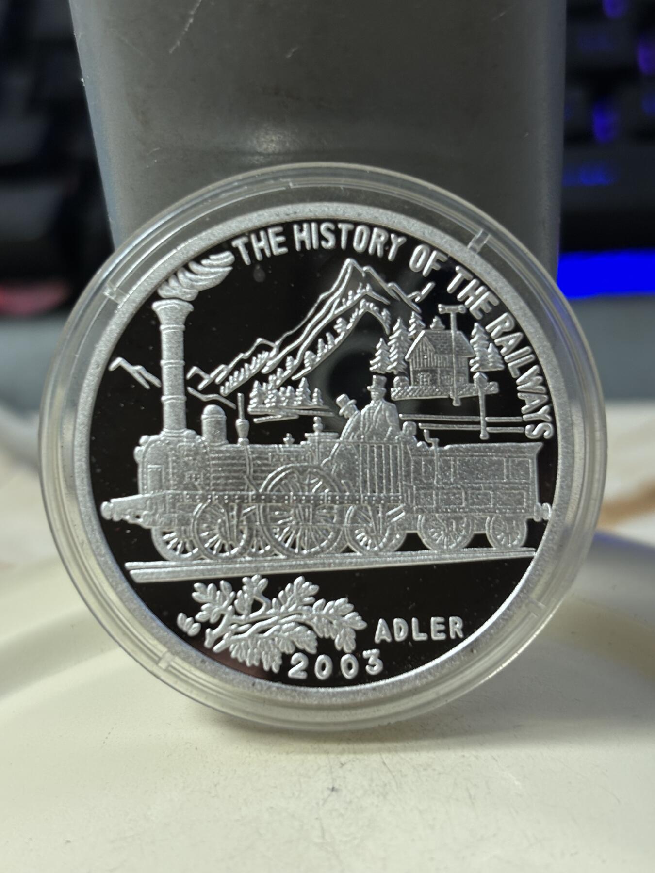 第190期拍卖 朝鲜2003年火车20克纪念银币3，999银