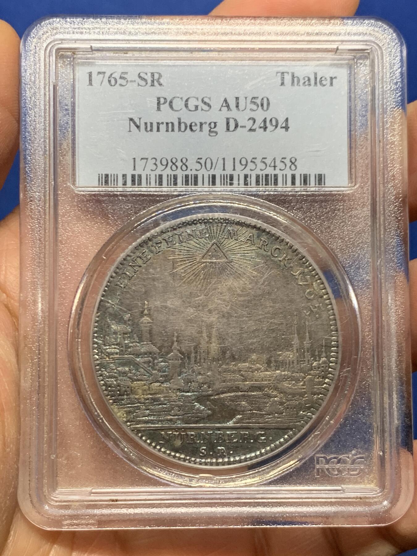 《竞宝斋》第463-465场 周日，周一，周二，3场连拍 （全场包邮）欢迎送拍 PCGS AU50 德国纽伦堡1765年双头鹰景观泰勒大银币 早期P盒 保存很不错 状态包浆同样惊人美丽
