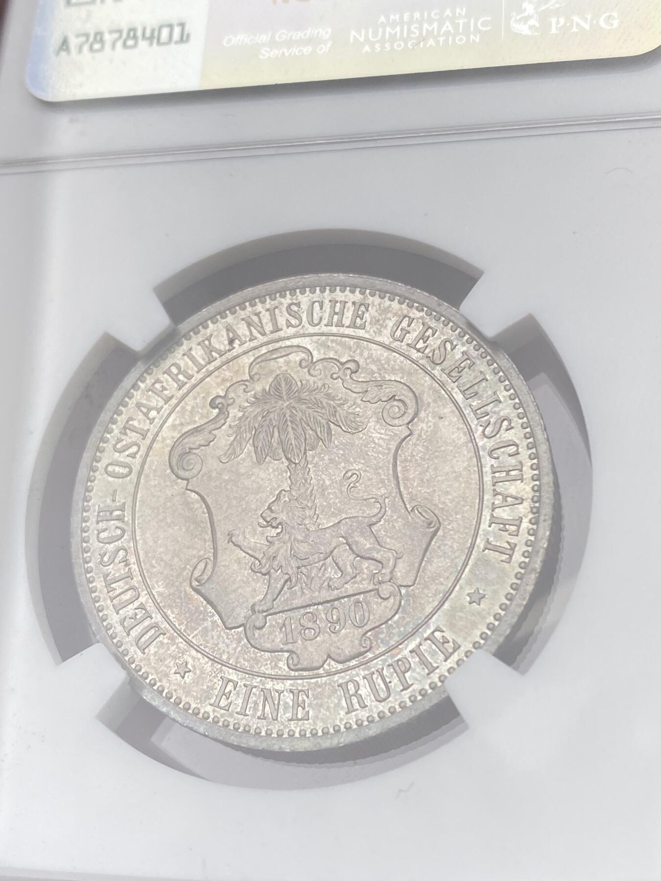 万国钱币拍卖第060期（万国六十期纪念大拍） NGC MS64 1890德属东非威廉二世戎装1卢比 德属大热门品种 全深打原味五彩裹身 观感超越分数的典藏级品质