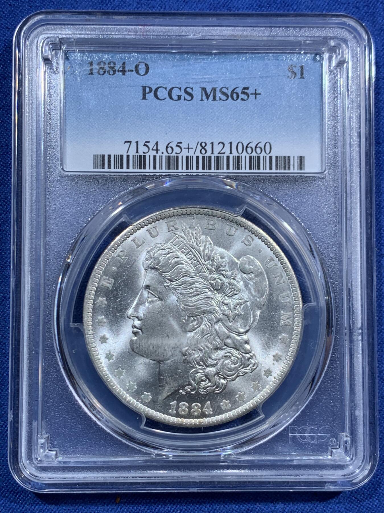 《竞宝斋》第463-465场 周日，周一，周二，3场连拍 （全场包邮）欢迎送拍 PCGS MS65+ 美国1884-O摩根银币 背面支撑有磕