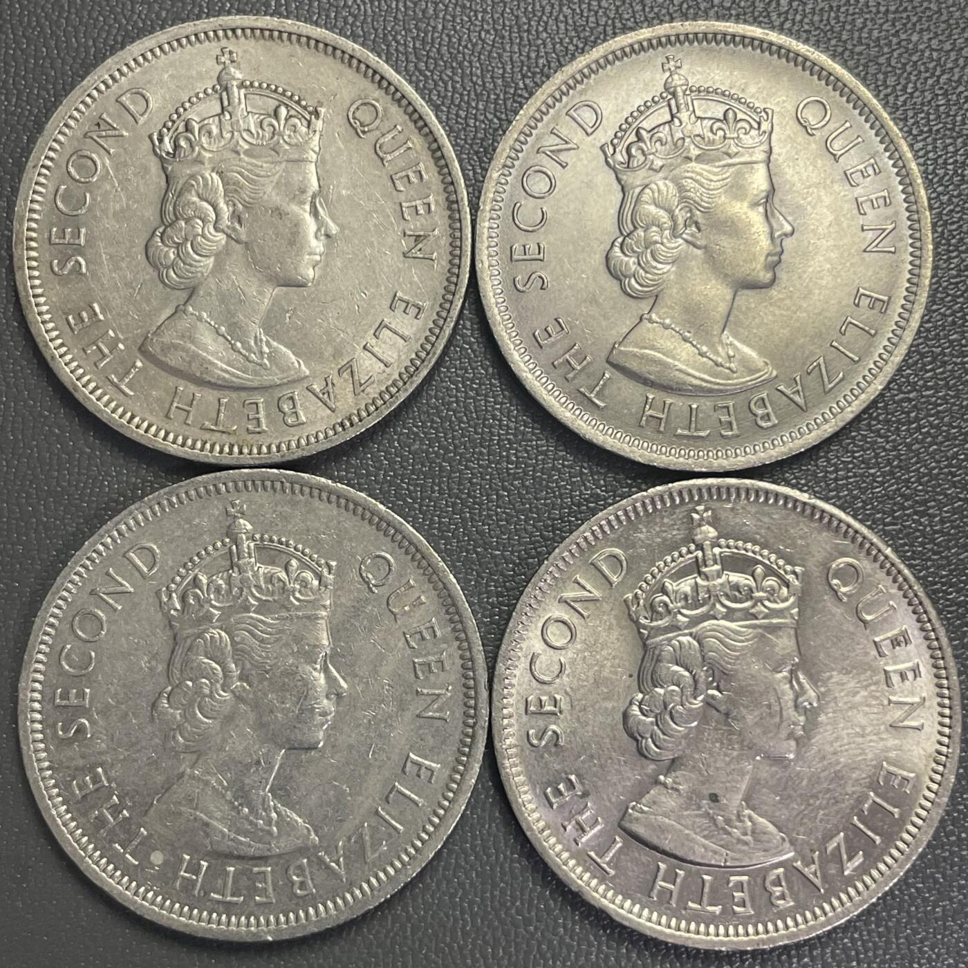 回流0207 香港1972-1975年大壹圆计4枚 齿边