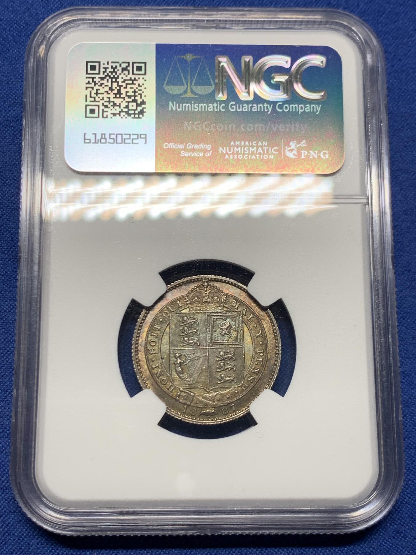 《竞宝斋》第463-465场 周日，周一，周二，3场连拍 （全场包邮）欢迎送拍 NGC MS63 英国1887年 维多利亚女王1先令银币。百年库藏。长期储存形成的欧洲五彩包浆，双面色泽皆美丽动人，63里的极品，姹紫嫣红。