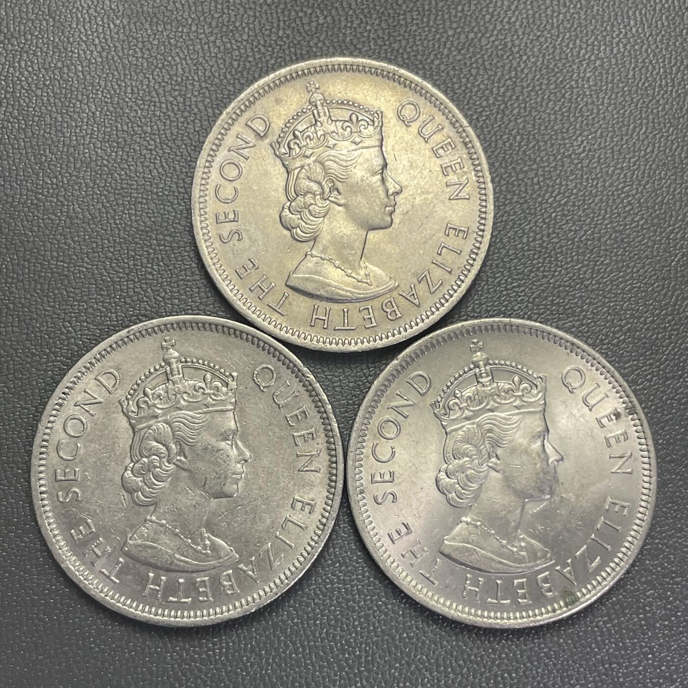 回流0207 香港1973年大壹圆3枚 齿边