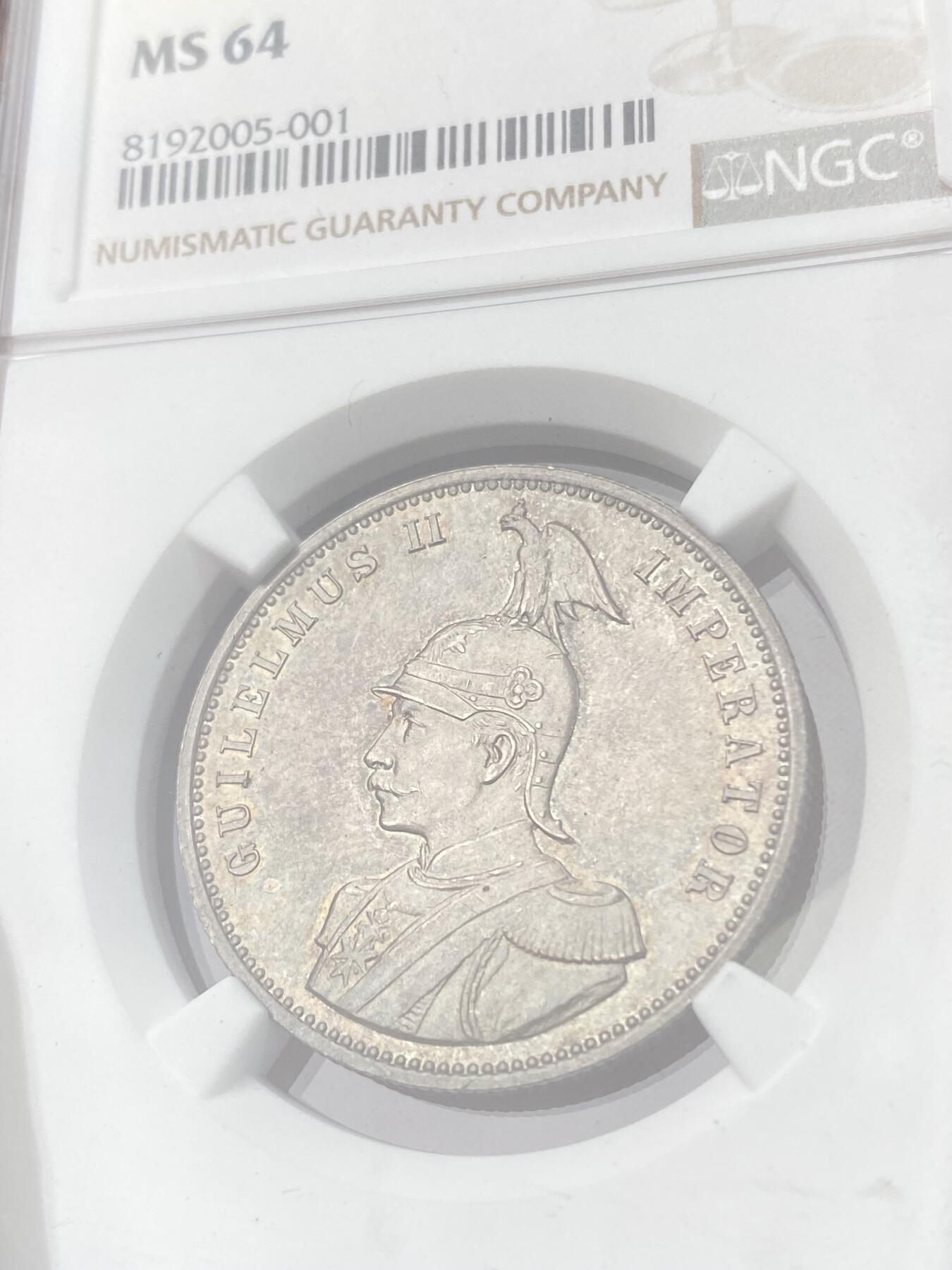 万国钱币拍卖第060期（万国六十期纪念大拍） NGC MS64 1890德属东非威廉二世戎装1卢比 德属大热门品种 全深打原味五彩裹身 观感超越分数的典藏级品质