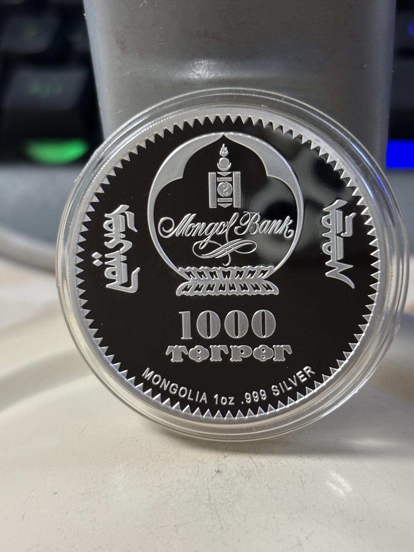 第190期拍卖 蒙古2020年伟人系列印度之父甘地1盎司纪念彩银币，999银，发行1000枚，木盒有破