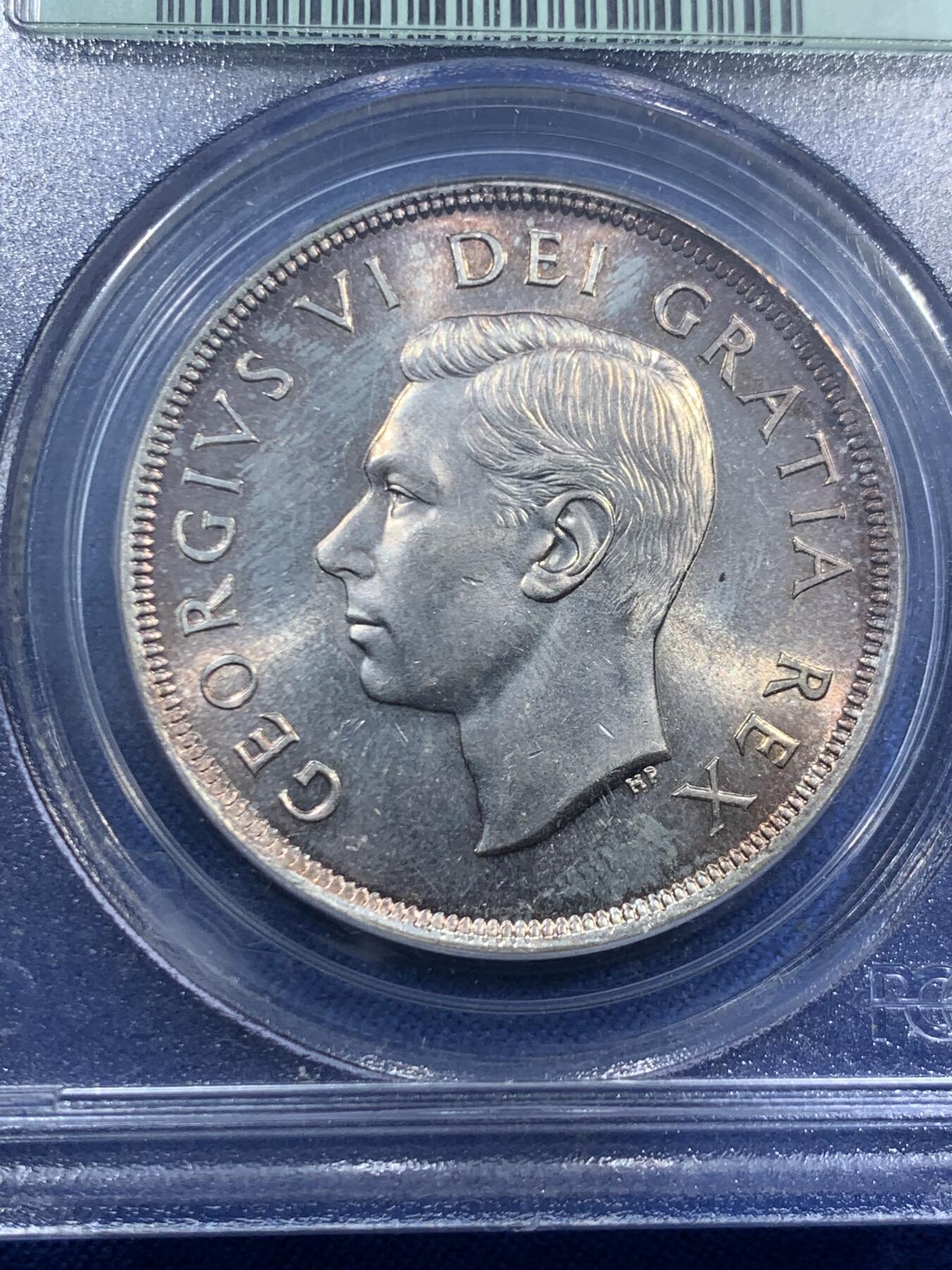 《竞宝斋》第463-465场 周日，周一，周二，3场连拍 （全场包邮）欢迎送拍 PCGS MS64 加拿大 1949年1DOLLAR帆船银币 原生状态，金橙色调主导的自然包浆使得局部泛现柔和虹彩，正背面细节锋利，轮廓清晰，非白币可比