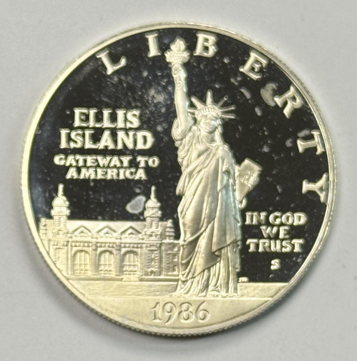 S&S Numismatic世界钱币-拍卖 第120期  美国1986年 埃利斯岛上的自由女神像 1美元精制纪念银币 26.73克900银