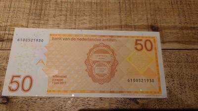 【新年十二拍】世界钱币～微拍第233期暨2026年第12期  多款老库存低价起拍 - 2011年安地列斯群岛50元 如图全新无47尾号930 全息膜处有如图瑕疵