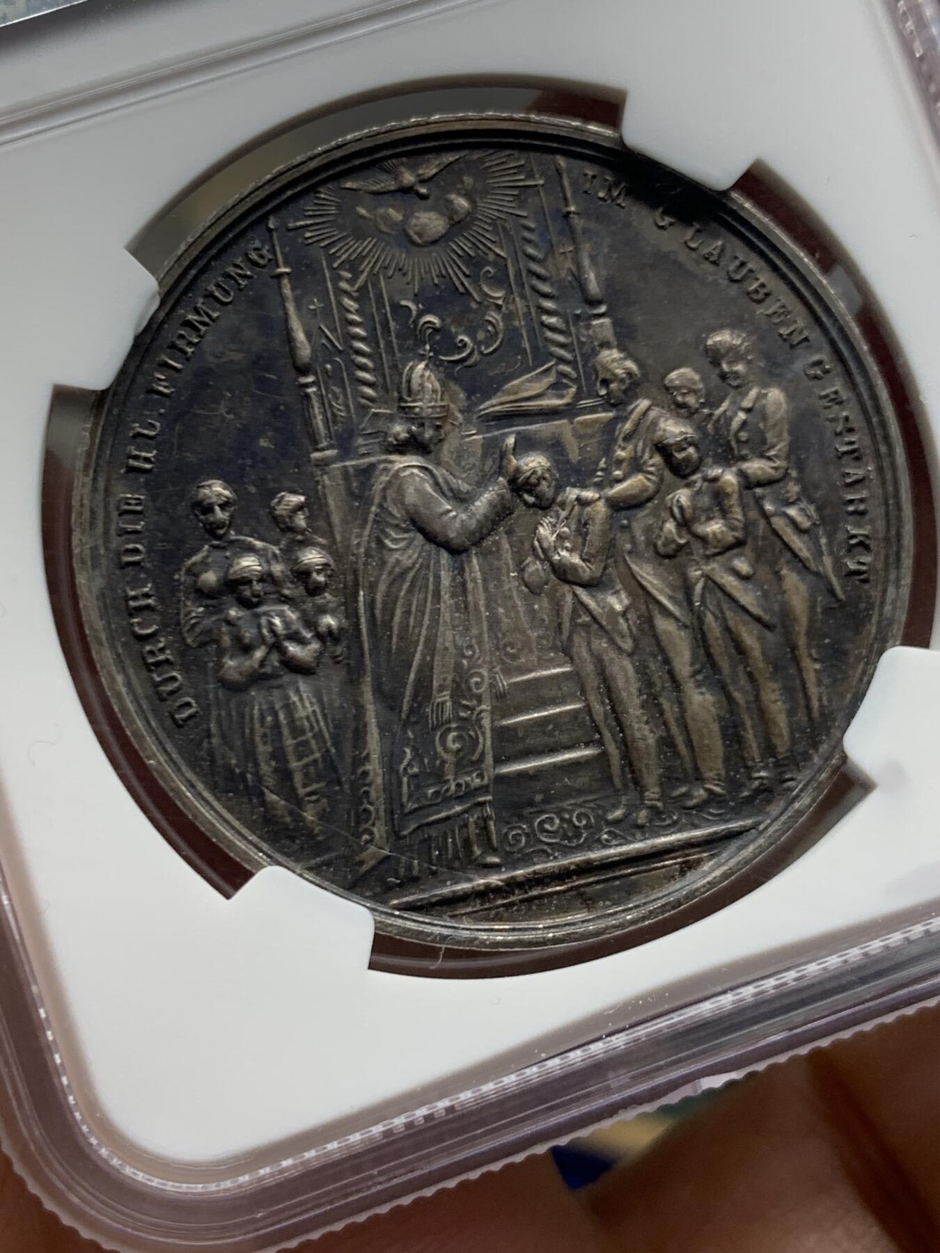 《竞宝斋》第464场 周日，周一，周二，3场连拍 （全场包邮）欢迎送拍 NGC UNC 奥地利19世纪教皇洗礼银章，UNC包浆厚给了环境污染，双面场景细节非常好