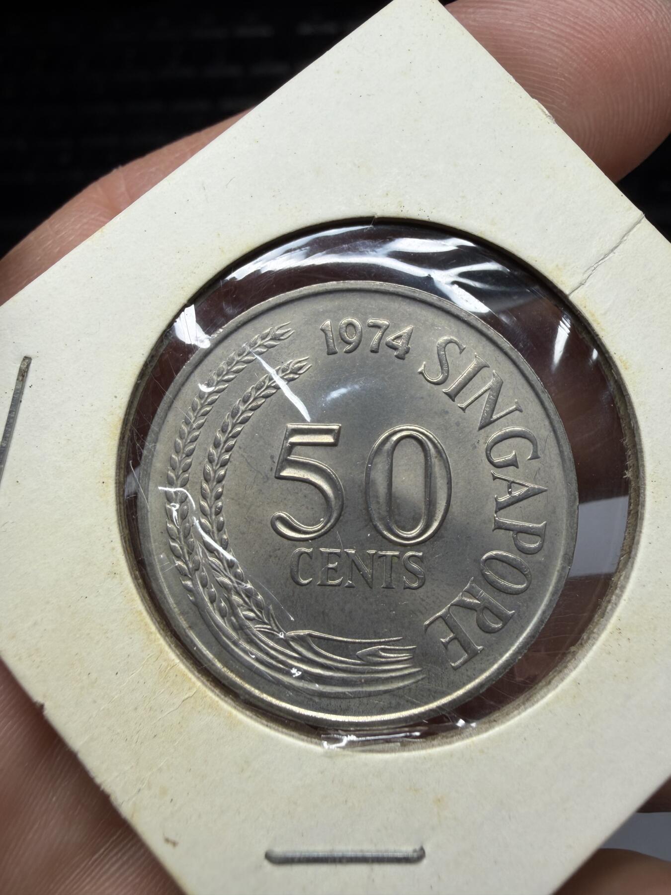 2025年集古藏今外币拍卖第二期-第3场—（总第303拍），可以寄存60天，满160元包邮。 1974年新加坡50分狮子鱼