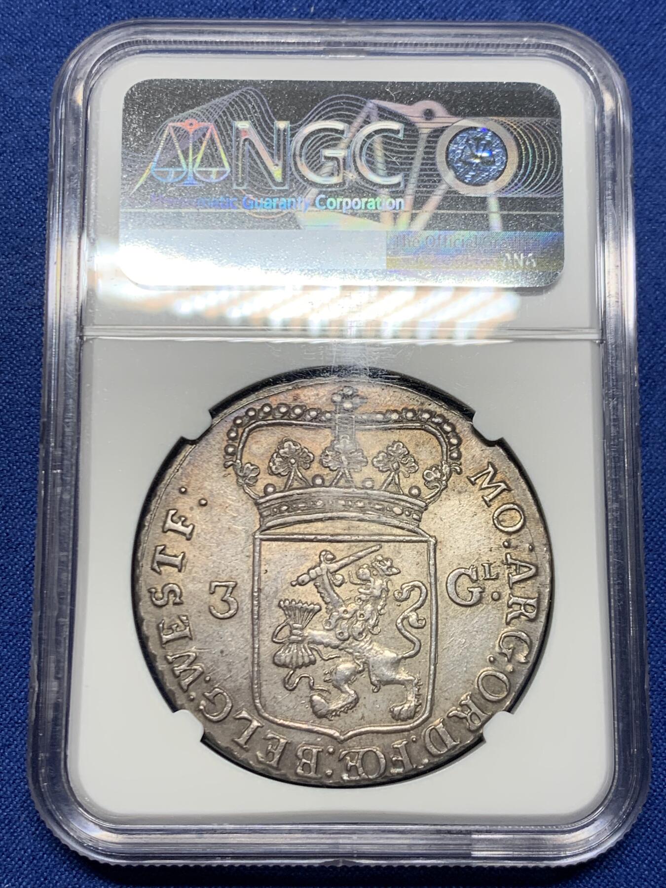 《竞宝斋》第464场 周日，周一，周二，3场连拍 （全场包邮）欢迎送拍 NGC AU58 荷兰1791年西弗里斯兰省女站人3盾大银币，环彩老包浆。打制非常好，个人所见同品种里唯一胸口高点无磨损弱打的一枚。女神五官细节生动，嘴角含笑。此品种不少MS都弱打，这样的打制极为难得