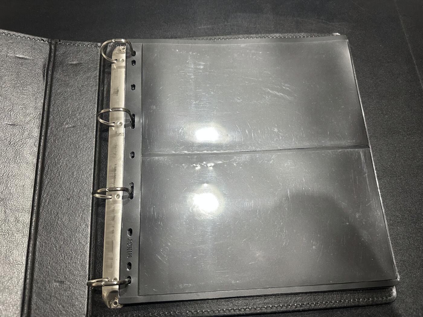 《外钞收藏家》第六百零七期（畅拍场）（本平台长期征集拍品、欢迎藏友们联系合作） 明泰2格评级币收藏册 含内页20张 近全新 品相如图