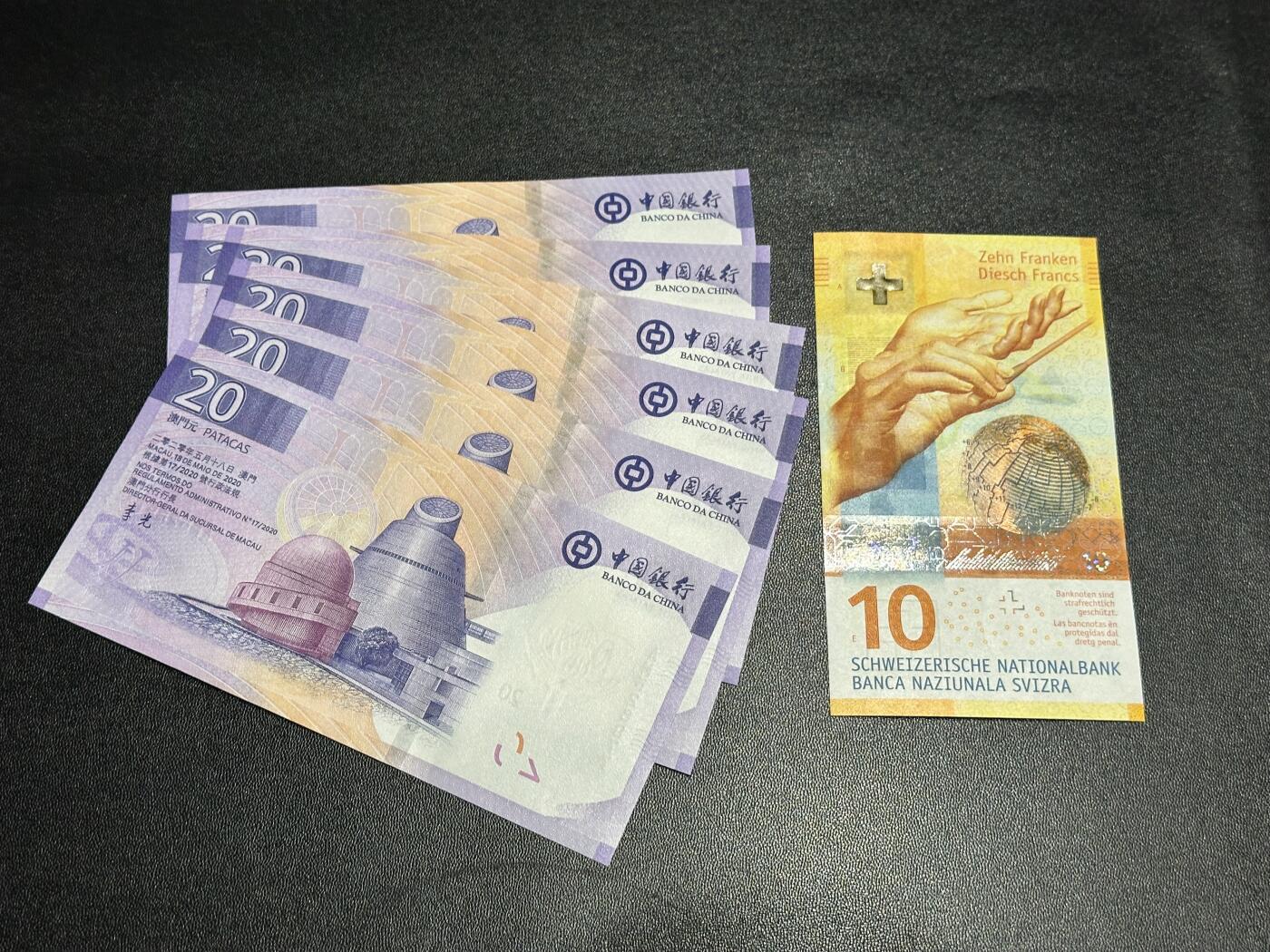 《外钞收藏家》第六百零七期（畅拍场）（本平台长期征集拍品、欢迎藏友们联系合作） 2017年瑞士手版10法郎+A冠澳门中国银行最新版20元6张一起 全新UNC