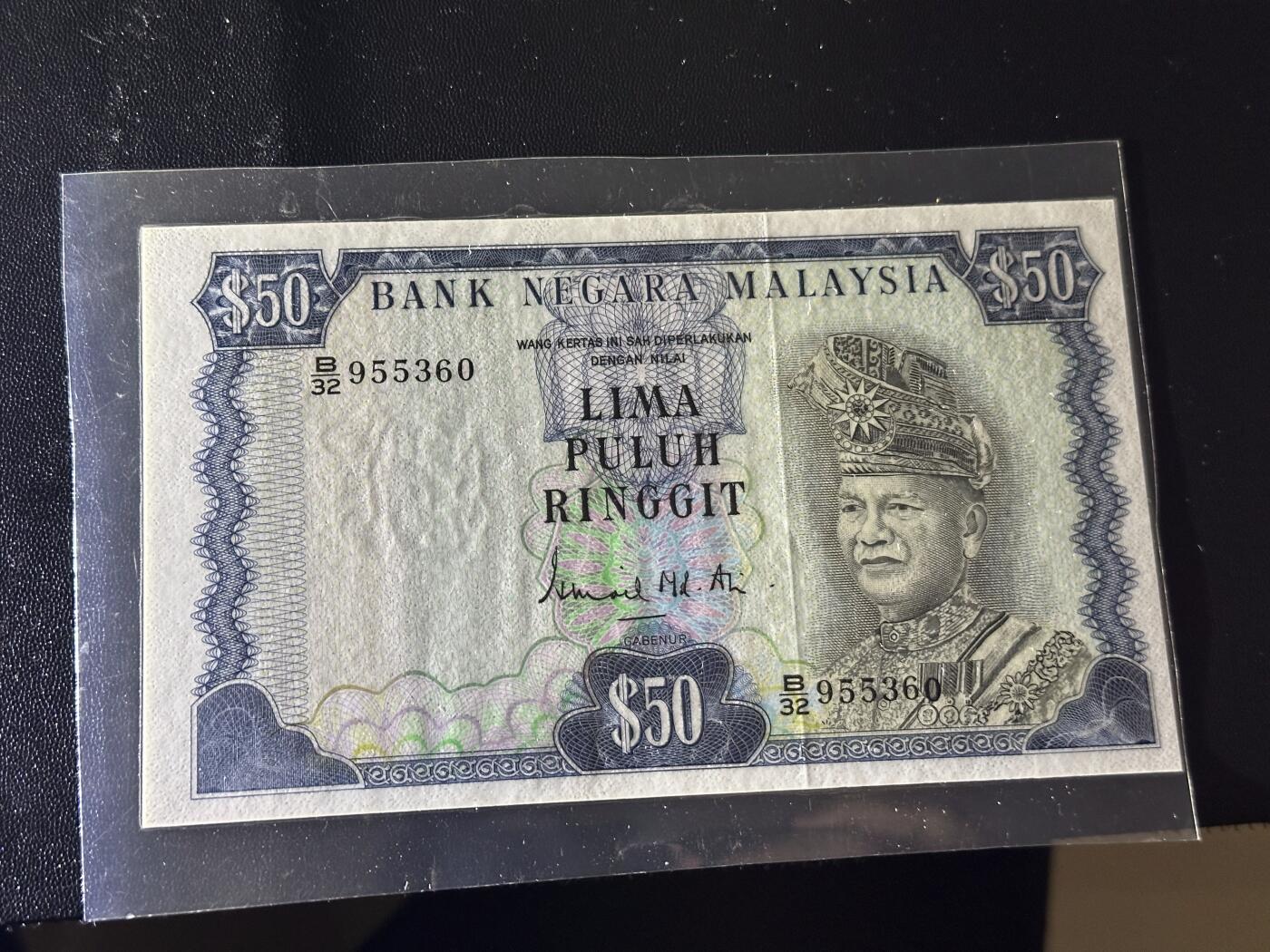 《外钞收藏家》第六百零七期（畅拍场）（本平台长期征集拍品、欢迎藏友们联系合作） 马来西亚50林吉特 BWC版 塑封了 品相如图