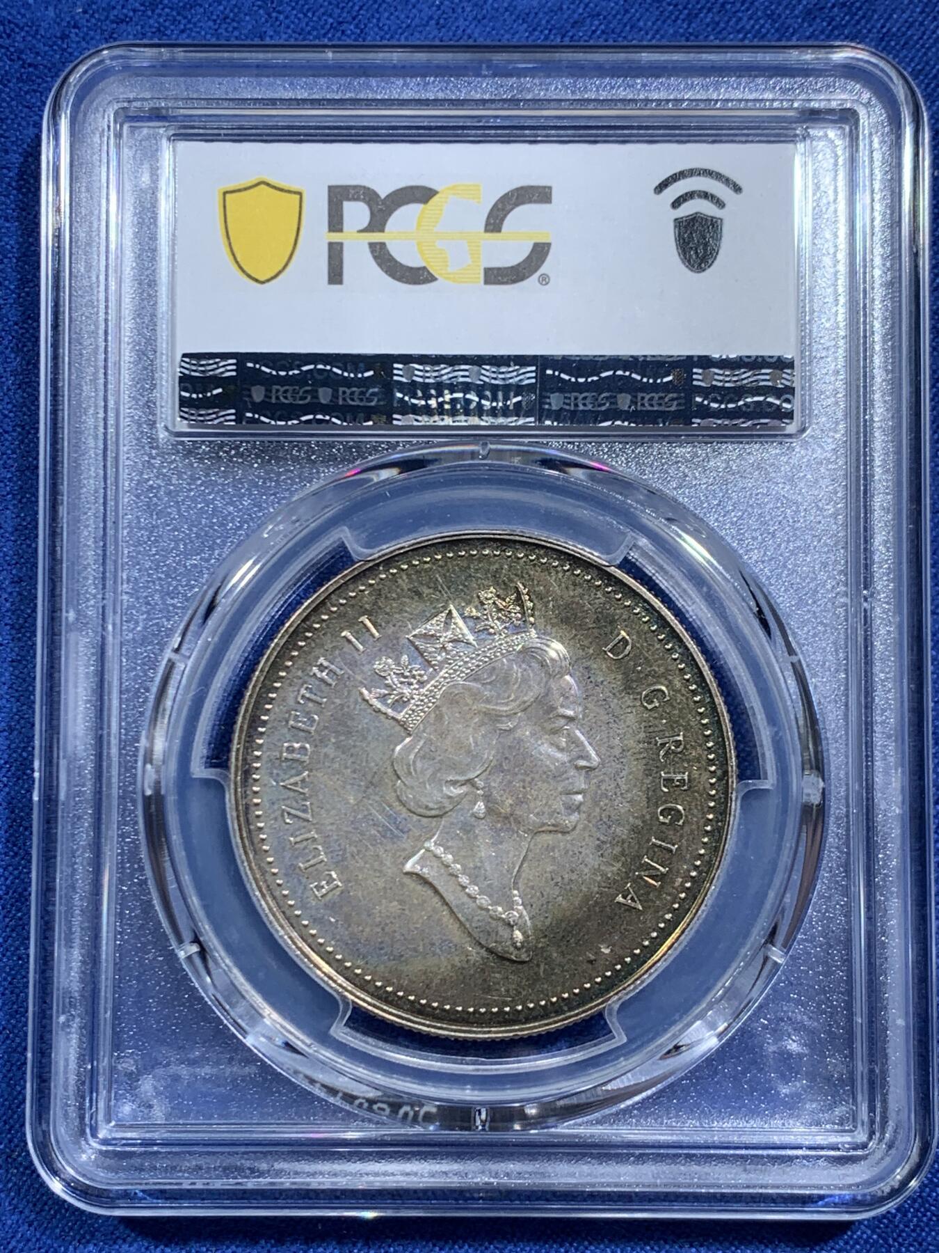 《竞宝斋》第464场 周日，周一，周二，3场连拍 （全场包邮）欢迎送拍 PCGS SP64 加拿大2000年发现之旅纪念银币，25g，900高银，sp特殊工艺非普制币可比，原拆送评，极致炫彩包浆导致压分