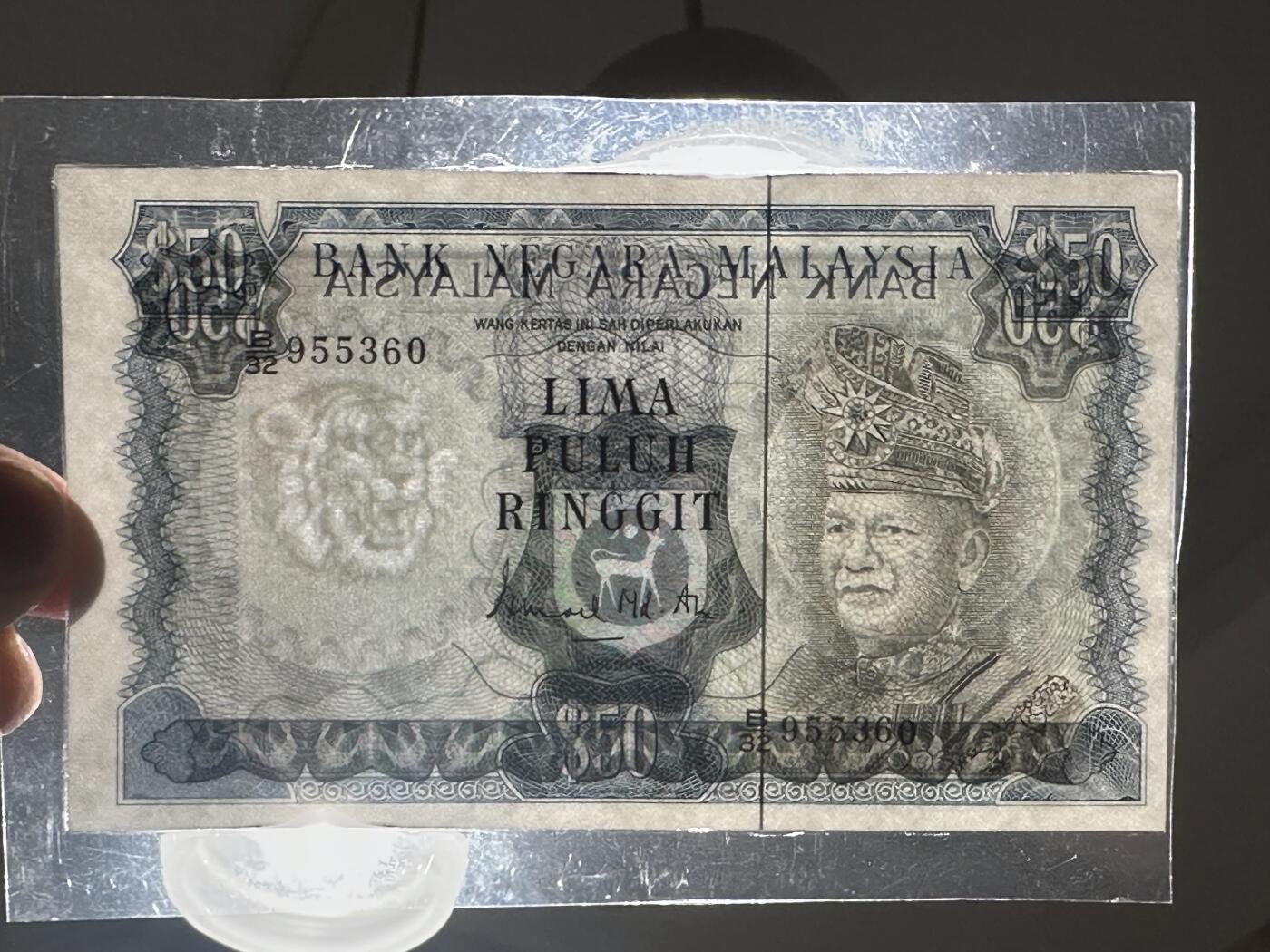 《外钞收藏家》第六百零七期（畅拍场）（本平台长期征集拍品、欢迎藏友们联系合作） 马来西亚50林吉特 BWC版 塑封了 品相如图