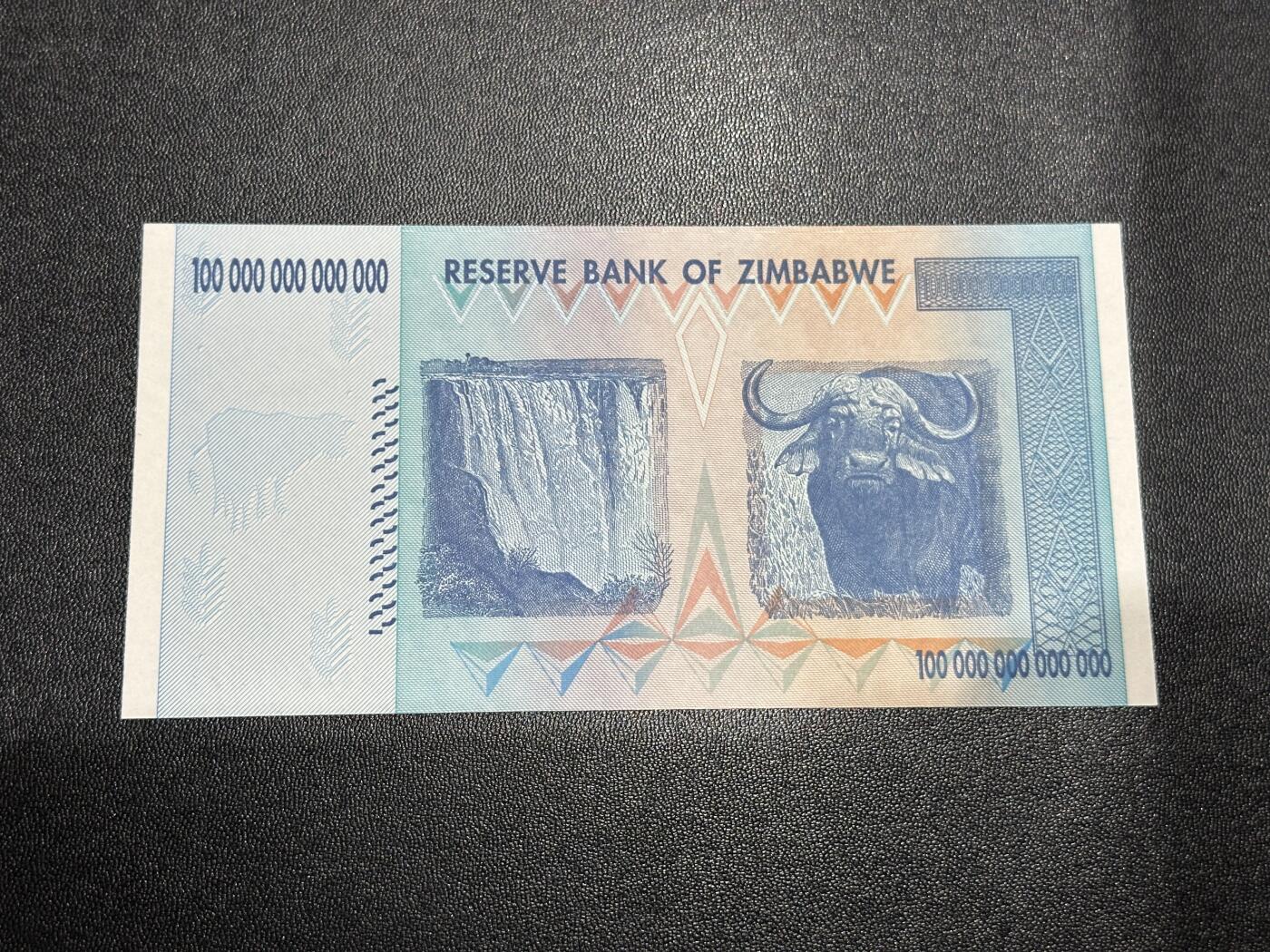 《外钞收藏家》第六百零七期（畅拍场）（本平台长期征集拍品、欢迎藏友们联系合作） 津巴布韦100万亿 AA冠 无47 全新UNC