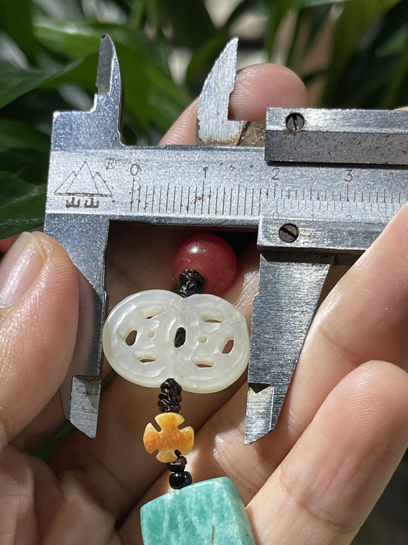 和田玉籽料手工挂饰 和田玉马上有钱