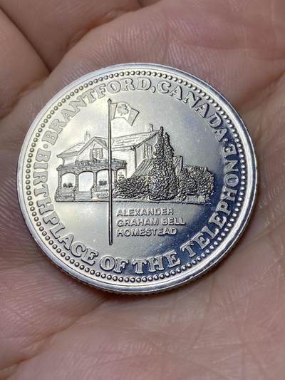 2026年第十八场(总第一百八十七场）外国好品散币场(免佣金) - 全新–加拿大🇨🇦1981年贸易元代币(加拿大布兰特福德发行电话诞生地纪念贸易元代币)