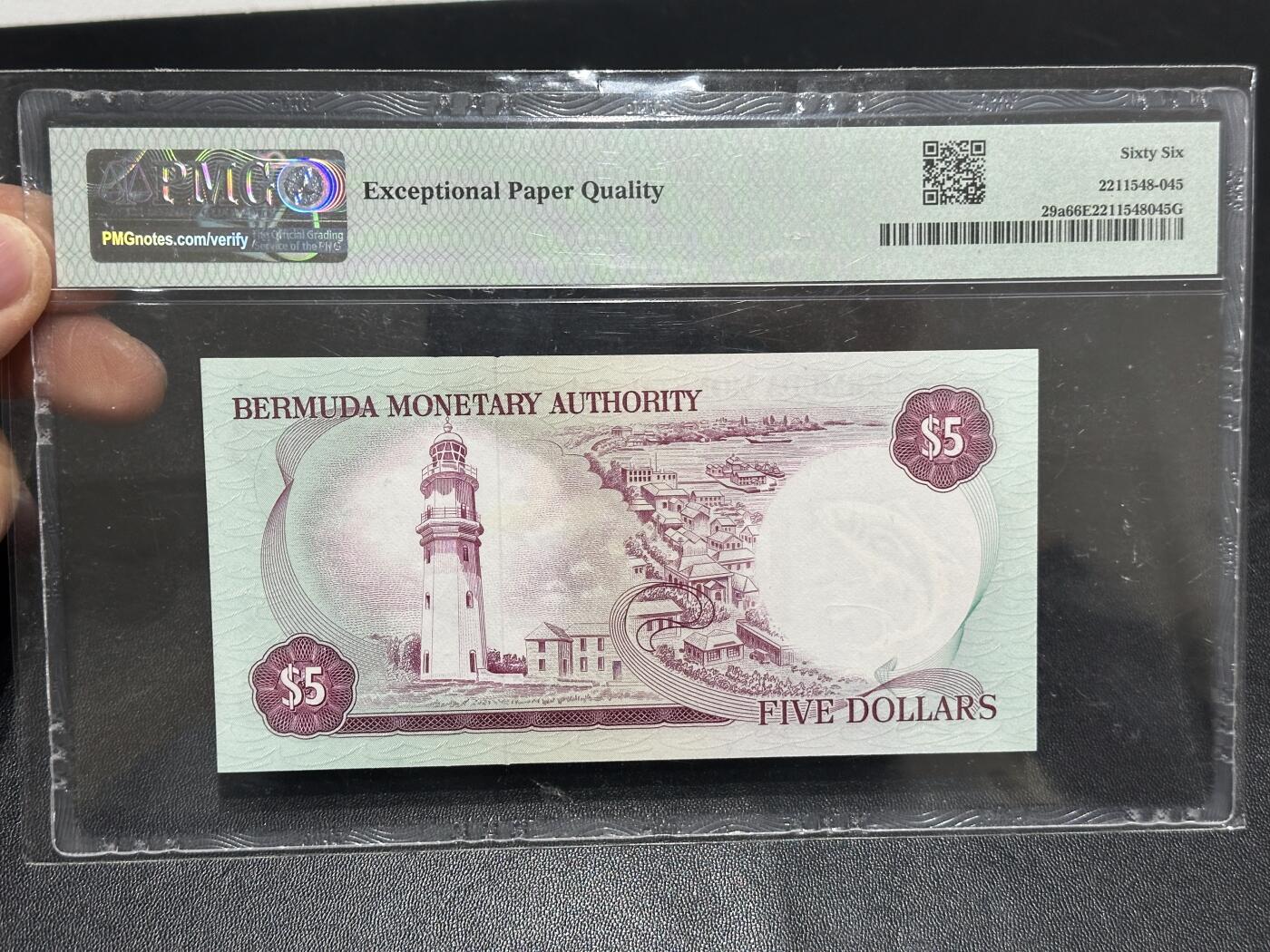 《外钞收藏家》第六百零七期（畅拍场）（本平台长期征集拍品、欢迎藏友们联系合作） 1978年百慕大5元 精美女王 PMG66 A/1冠