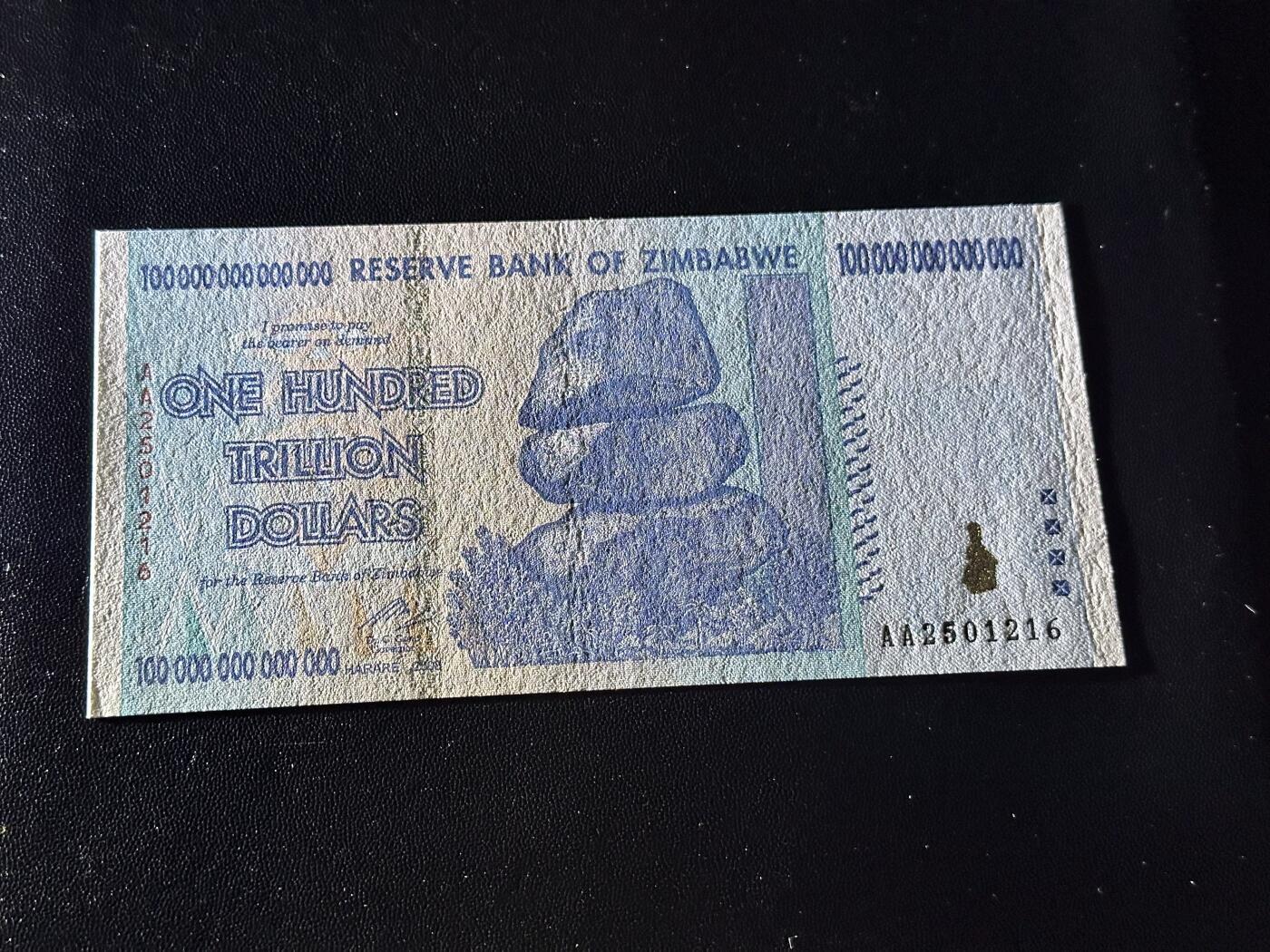 《外钞收藏家》第六百零七期（畅拍场）（本平台长期征集拍品、欢迎藏友们联系合作） 津巴布韦100万亿 AA冠 无47 全新UNC