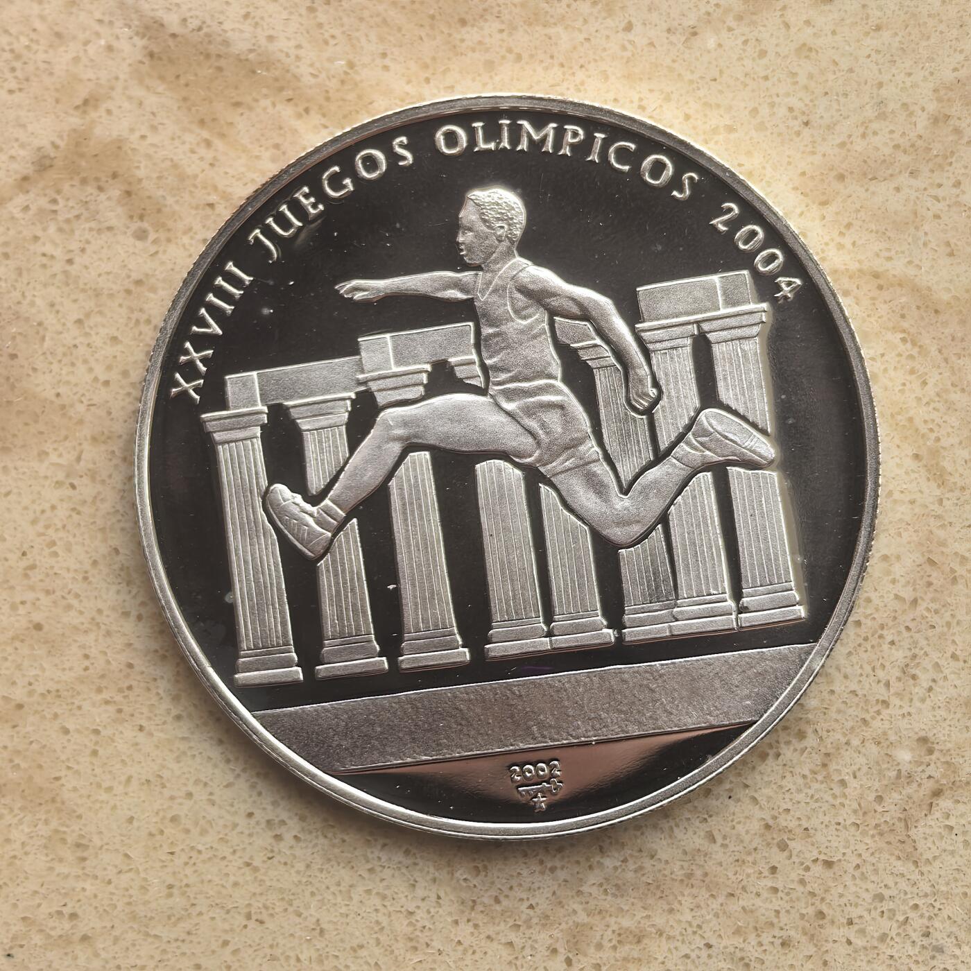 道一币馆币章第一百六十五场 古巴2002年雅典奥运会10比索精制银币  20g 999s