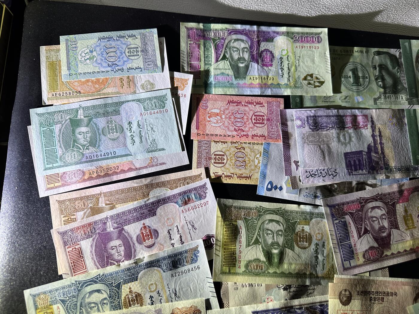 《外钞收藏家》第六百零七期（畅拍场）（本平台长期征集拍品、欢迎藏友们联系合作） 蒙古、危地马拉、叙利亚、朝鲜、埃及等几十张一起 大部分都是全新 个别非全新 如图