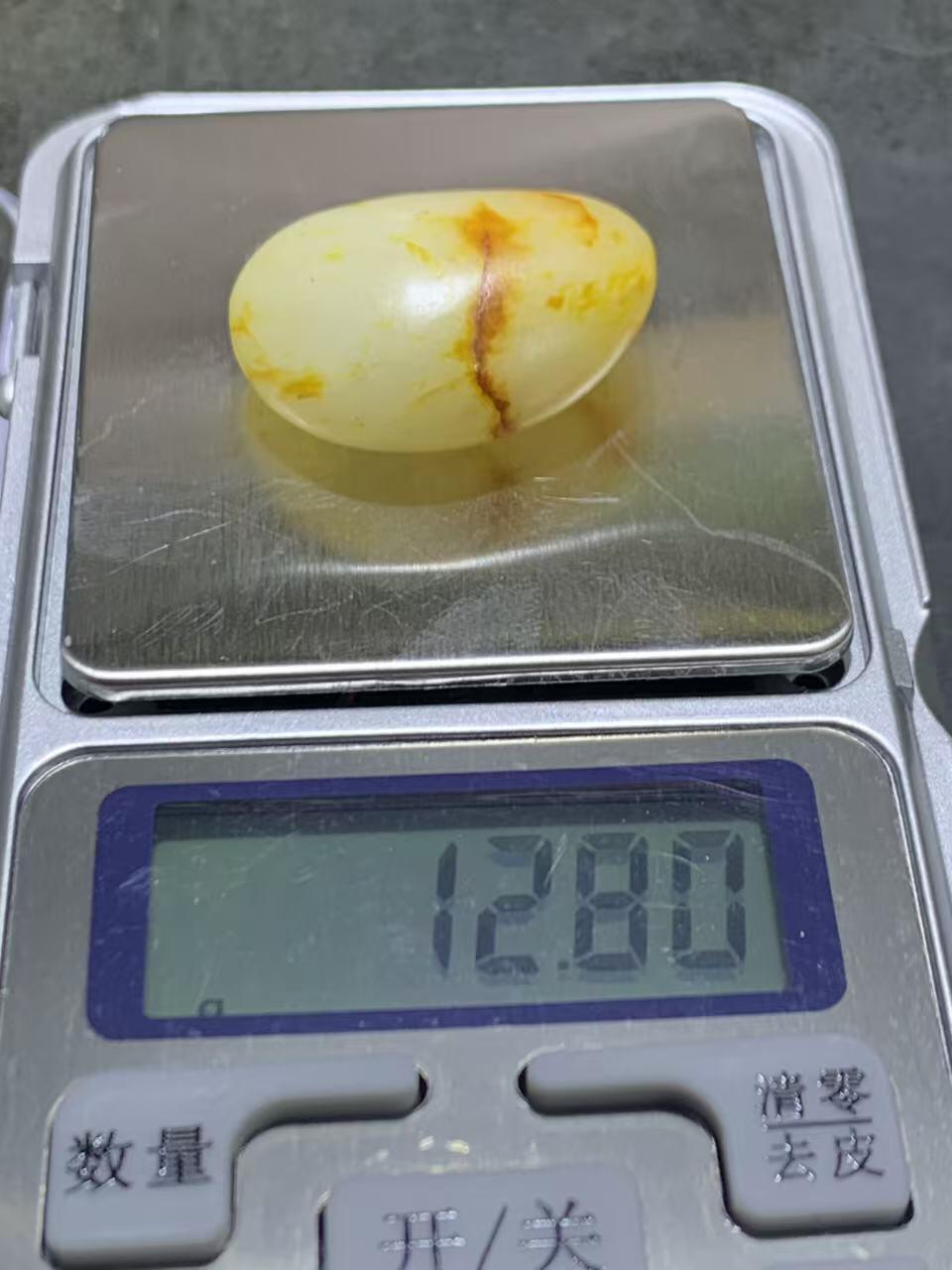 精美洒金皮和田白玉独籽原石一颗，