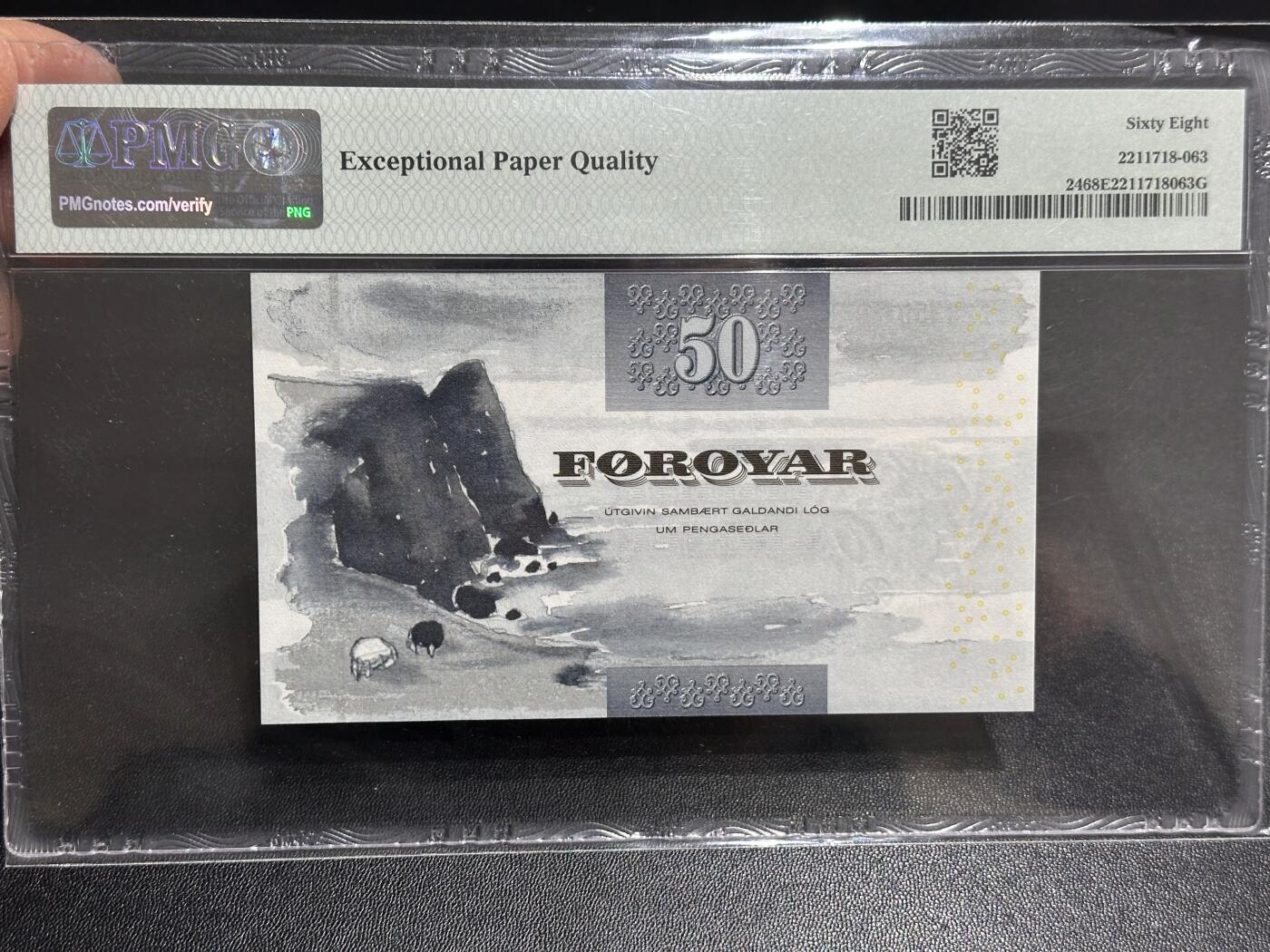 《外钞收藏家》第六百零七期（畅拍场）（本平台长期征集拍品、欢迎藏友们联系合作） 2001年法罗群岛50克朗 初版 PMG68 无47靓号