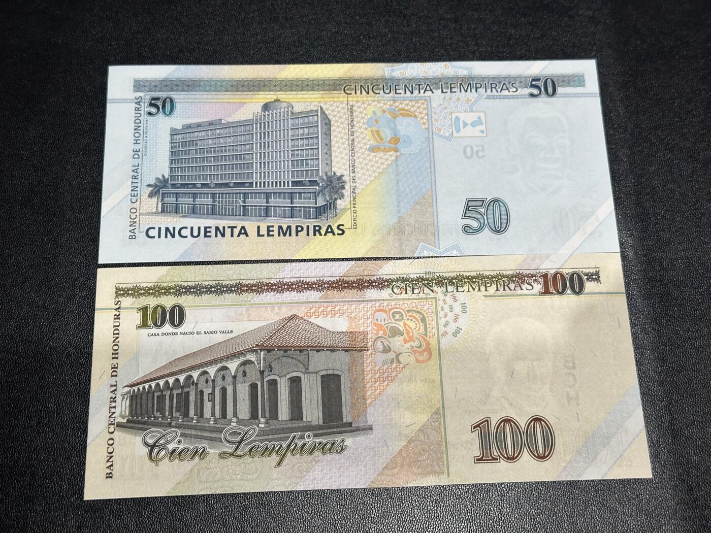《外钞收藏家》第六百零七期（畅拍场）（本平台长期征集拍品、欢迎藏友们联系合作） 2004年洪都拉斯50和100面额 2张一起 全新UNC