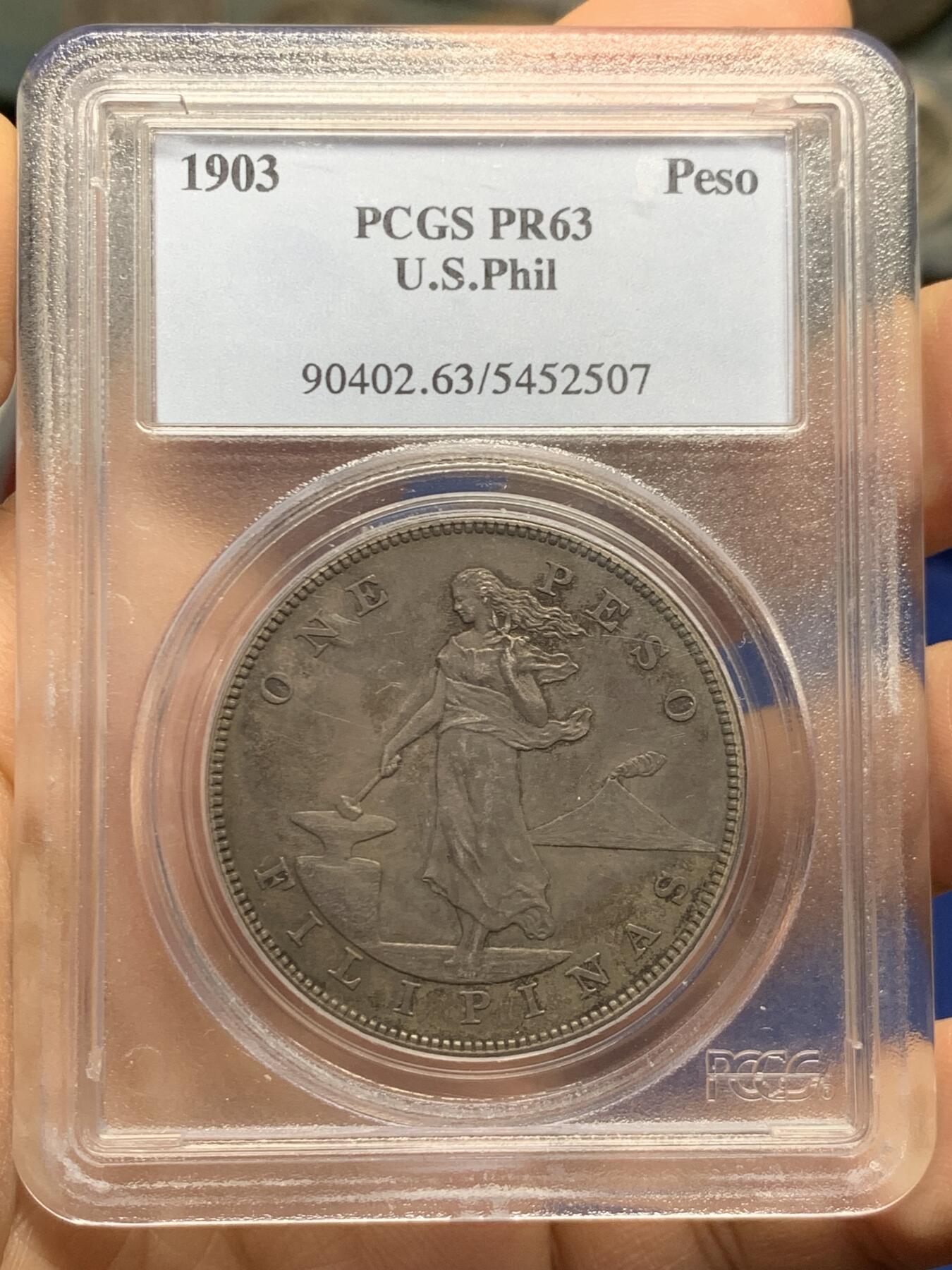 《竞宝斋》第464场 周日，周一，周二，3场连拍 （全场包邮）欢迎送拍 PCGS PR63 美属菲律宾1903年打铁女神1比索精制银币，精制大样，发行量2558枚，极少见的品种，同品种61分白币麦稀奇去年成交价含佣金7000左右