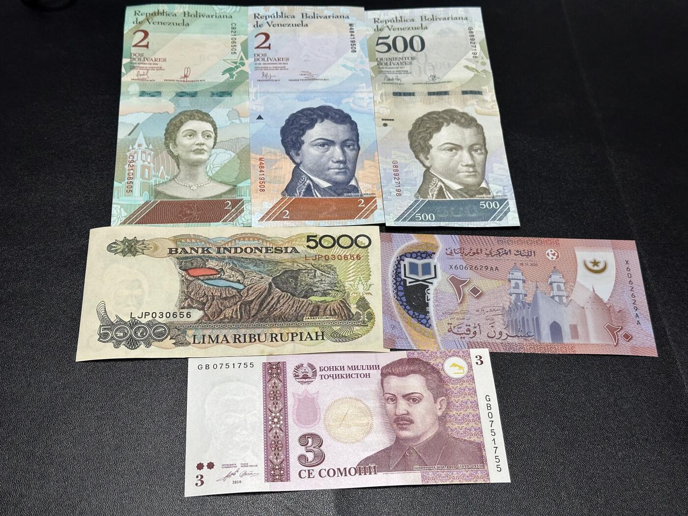 《外钞收藏家》第六百零七期（畅拍场）（本平台长期征集拍品、欢迎藏友们联系合作） 委内瑞拉3张——印尼5000+毛里塔尼亚+塔吉克斯坦一起 全新 印尼不绝有小裂口和荧光瑕疵