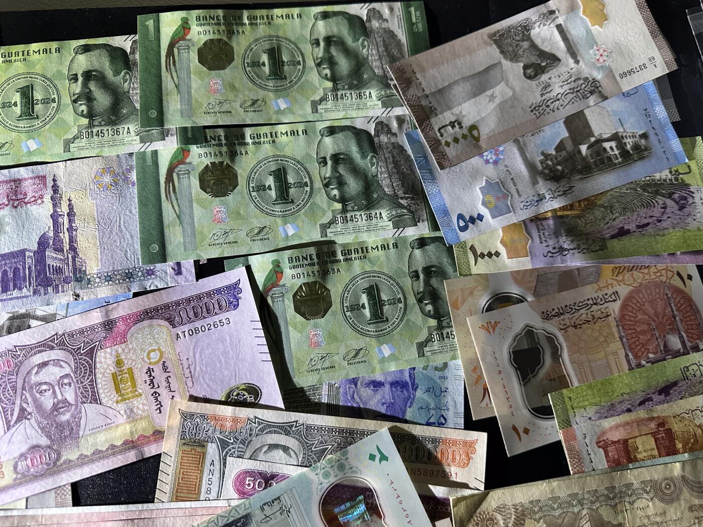 《外钞收藏家》第六百零七期（畅拍场）（本平台长期征集拍品、欢迎藏友们联系合作） 蒙古、危地马拉、叙利亚、朝鲜、埃及等几十张一起 大部分都是全新 个别非全新 如图