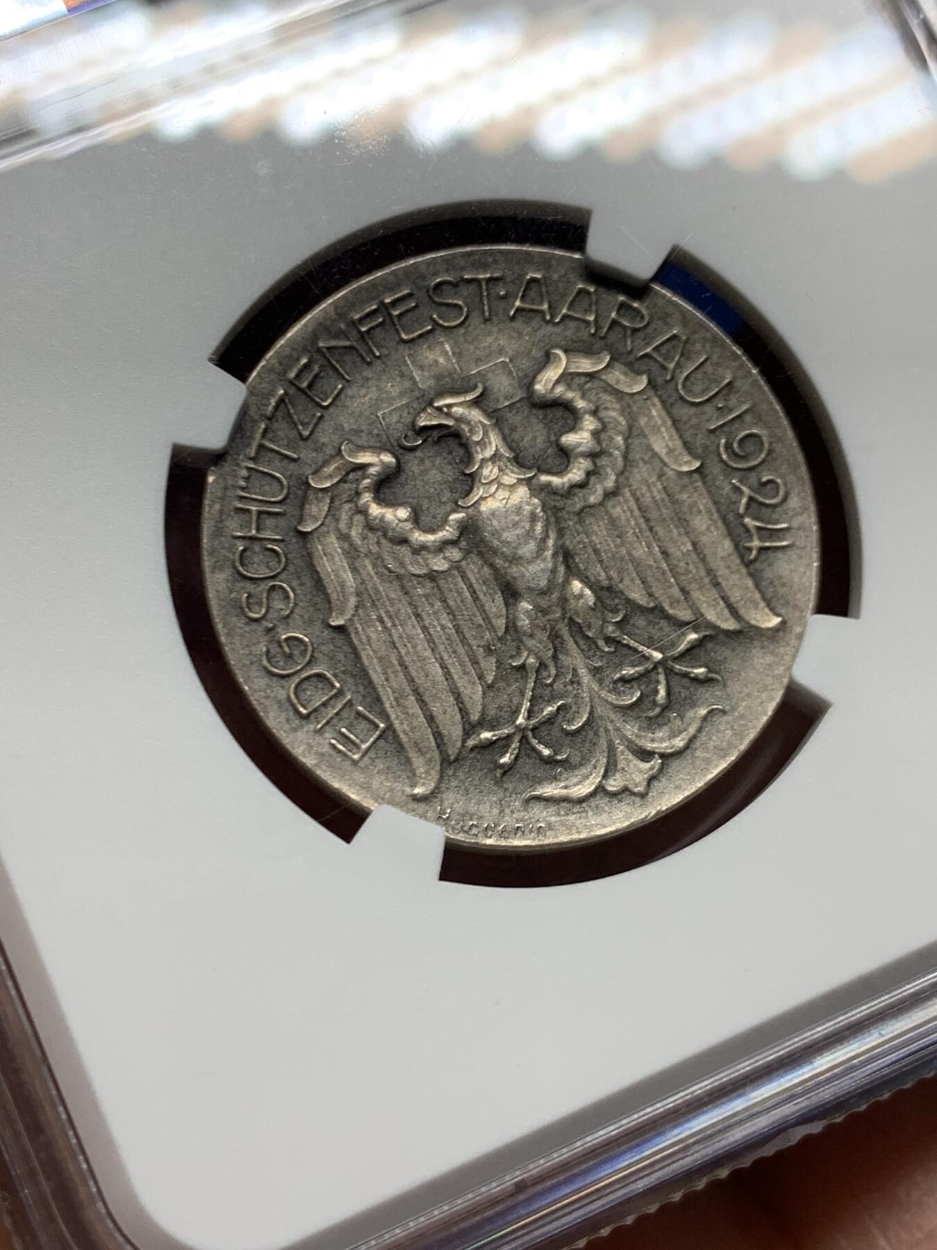 《竞宝斋》第465场 周日，周一，周二，3场连拍 （全场包邮）欢迎送拍 NGC MS64 瑞士1924年阿尔高州阿劳射击节银章 磨砂质感 鹰徽细腻 整体包浆搭配图案映衬出十足朦胧感