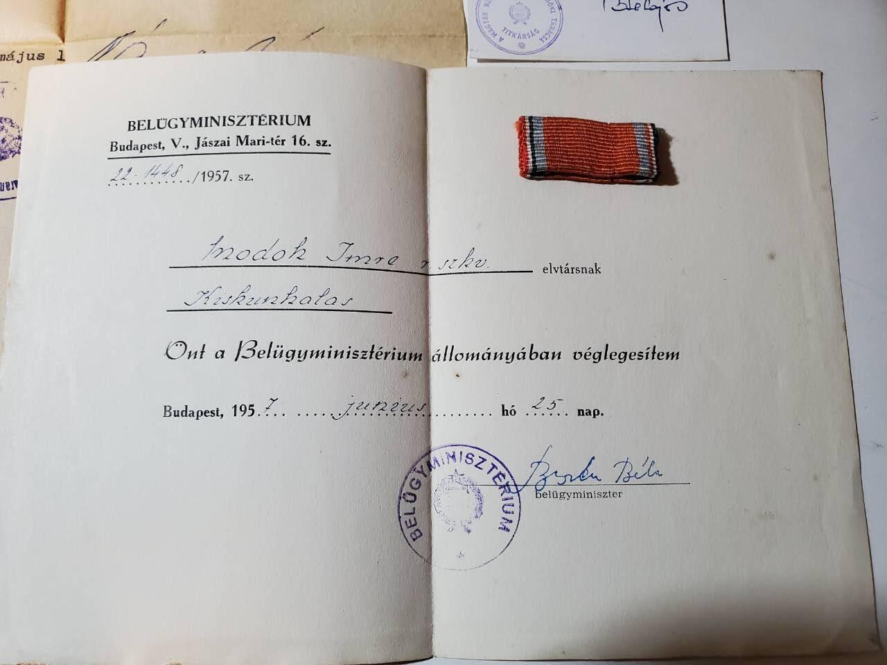 韵星假日军品类拍卖第三十九期暨默多克中校夫妇专场 -- Rimey Holidays Militaria Auction 39 & The Modoks Collection  匈牙利人民共和国默多克中校卓绝服务证章证书、1958（拉克西匈牙利）内务部基础警察武装力量培训结束证书 内务部表彰信