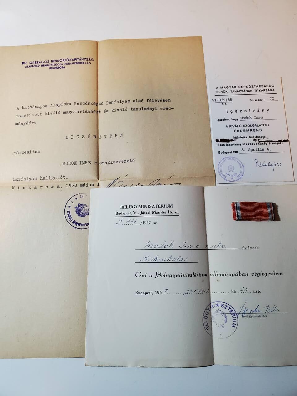 韵星假日军品类拍卖第三十九期暨默多克中校夫妇专场 -- Rimey Holidays Militaria Auction 39 & The Modoks Collection  匈牙利人民共和国默多克中校卓绝服务证章证书、1958（拉克西匈牙利）内务部基础警察武装力量培训结束证书 内务部表彰信