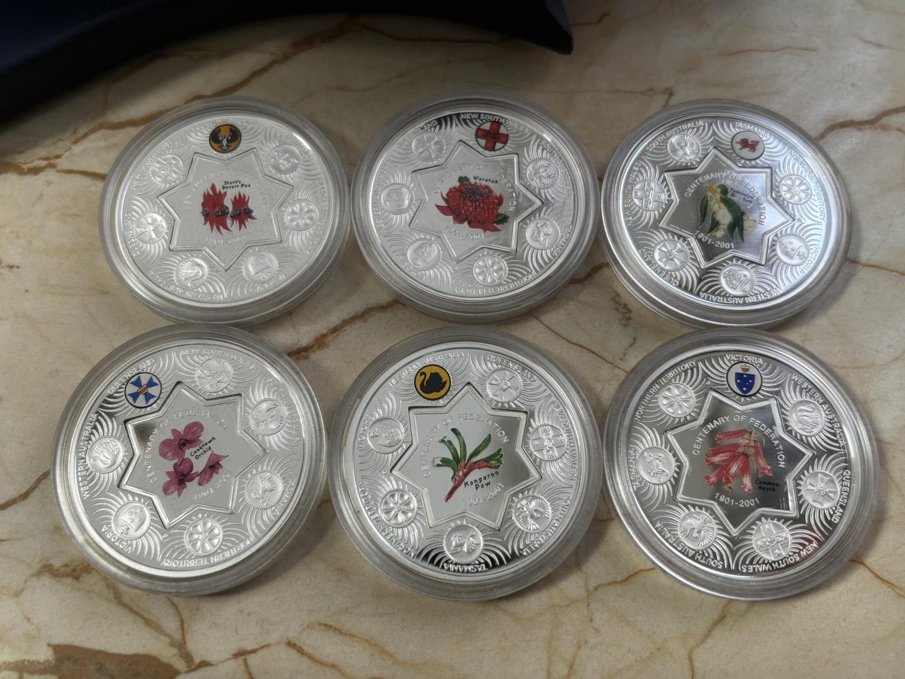 第190期拍卖 澳大利亚2001年1澳元X6精制彩色子母银套币 澳大利亚百年联邦州纪念-各州花卉 999银1盎司X6 发行量：1500 盒证全（盒坏）