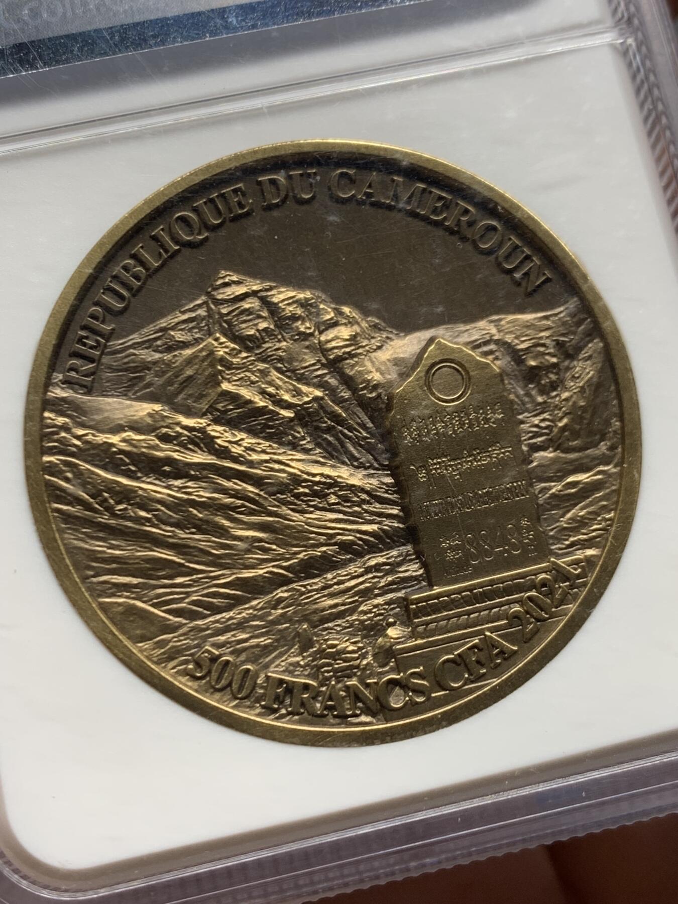 《竞宝斋》第465场 周日，周一，周二，3场连拍 （全场包邮）欢迎送拍 NGC MS70 喀麦隆2021世界高峰珠峰高浮雕铜币，53克，发行333枚，加厚盒。