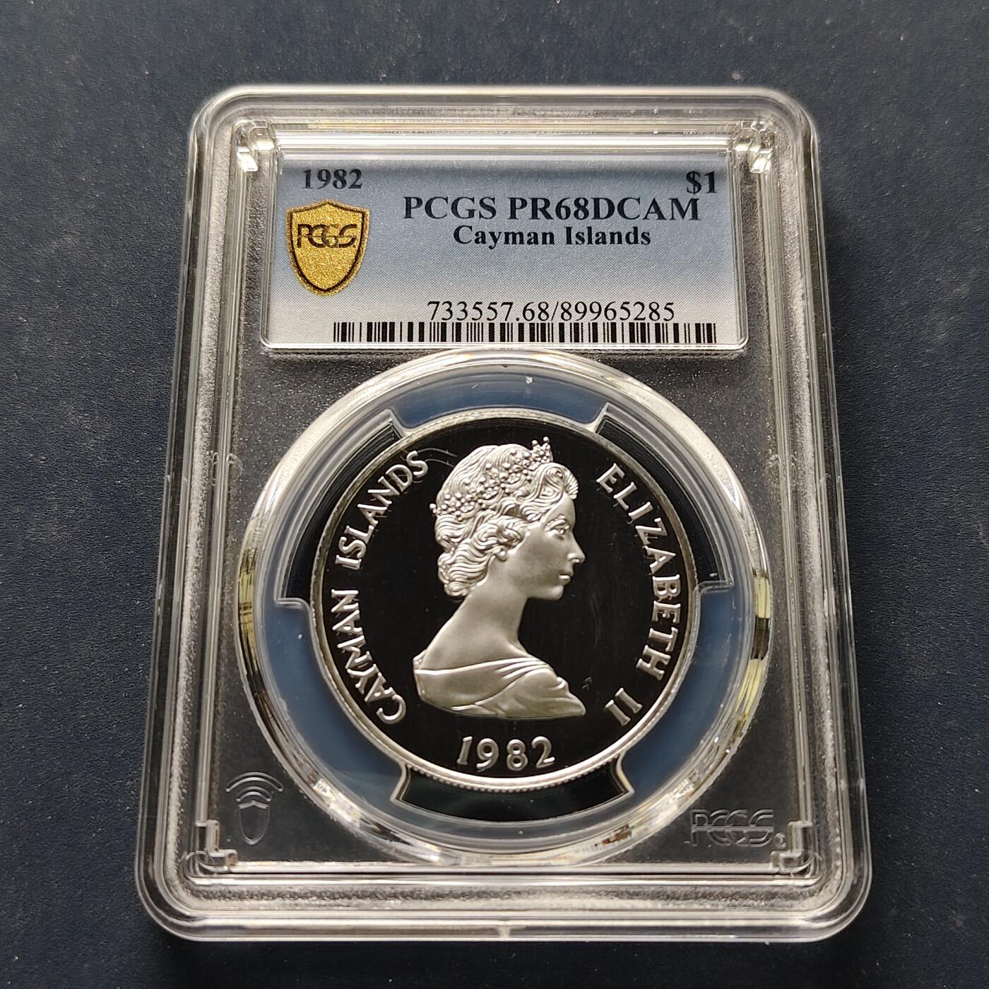 【全场包邮】纯粹捡漏拍501场-持续更新中 【收藏级·冠军分·稀少】开曼群岛1982年1元凤凰木精制银币【34毫米18.14克92.5%】-量589-PCGS PR68 DCAM