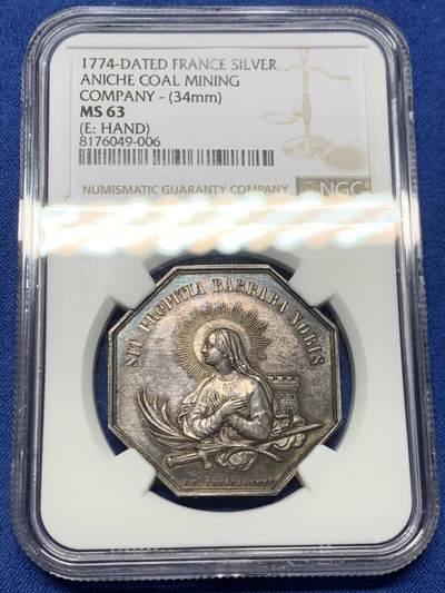 《竞宝斋》第465场 周日，周一，周二，3场连拍 （全场包邮）欢迎送拍 - NGC MS63 法国阿尼什矿山和锻造厂八角银质代币，圣芭芭拉的形象，34mm，手指边铭。