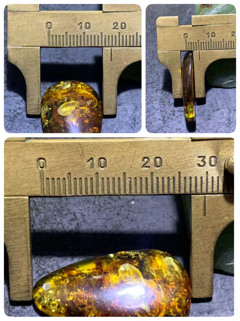 乌克兰花珀通货水滴形吊坠一个，