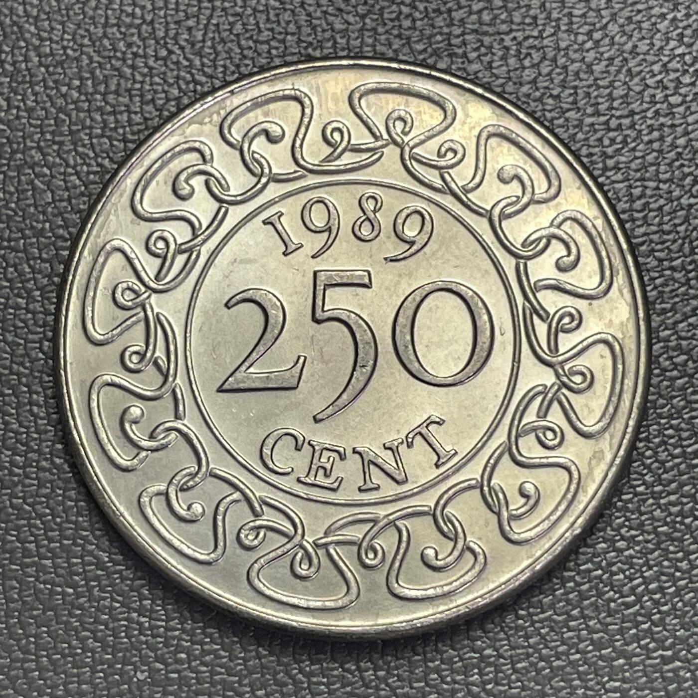 回流0207 少见 苏里南1989年250分（2.5盾）国徽