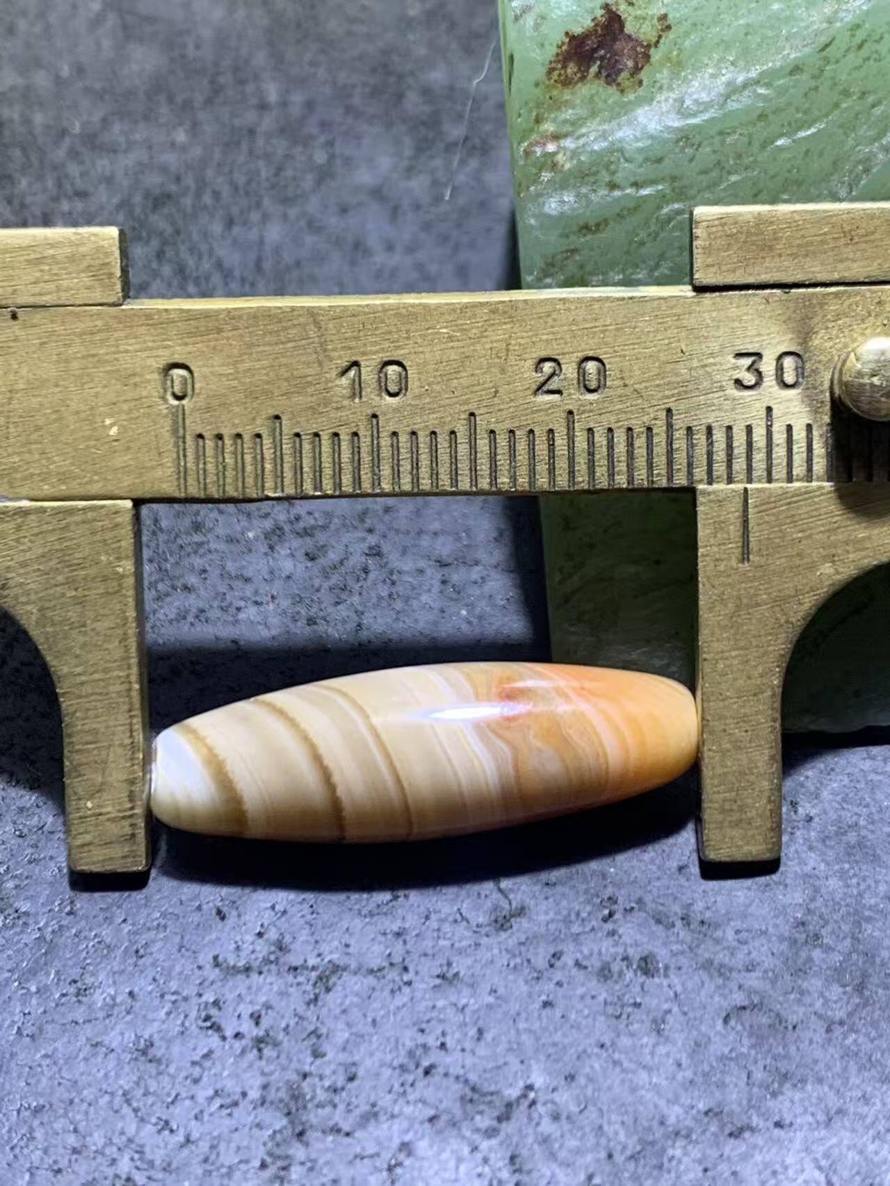 高玉化缠丝玛瑙随形通货桶珠一个