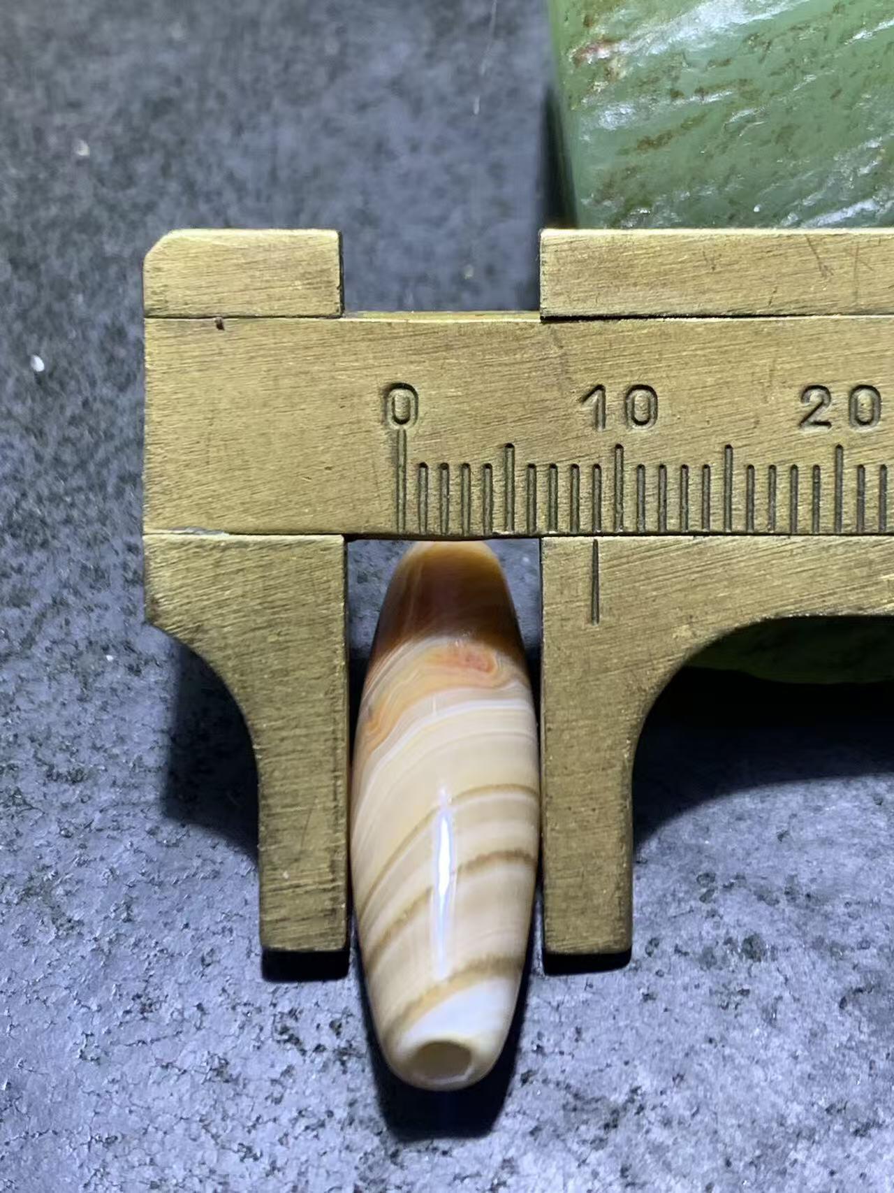 高玉化缠丝玛瑙随形通货桶珠一个