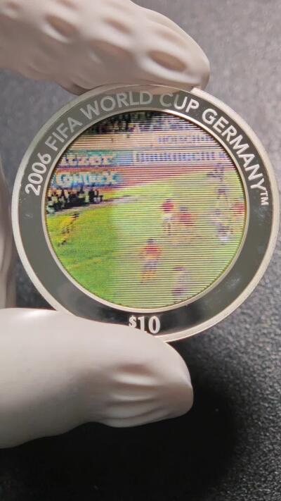【德藏】世界币章拍卖第164期（拍品征集中~欢迎藏友联系） 2005年 所罗门群岛2006年德国世界杯10元光栅纪念银币 999银 直径约：40.5mm；重约：32g